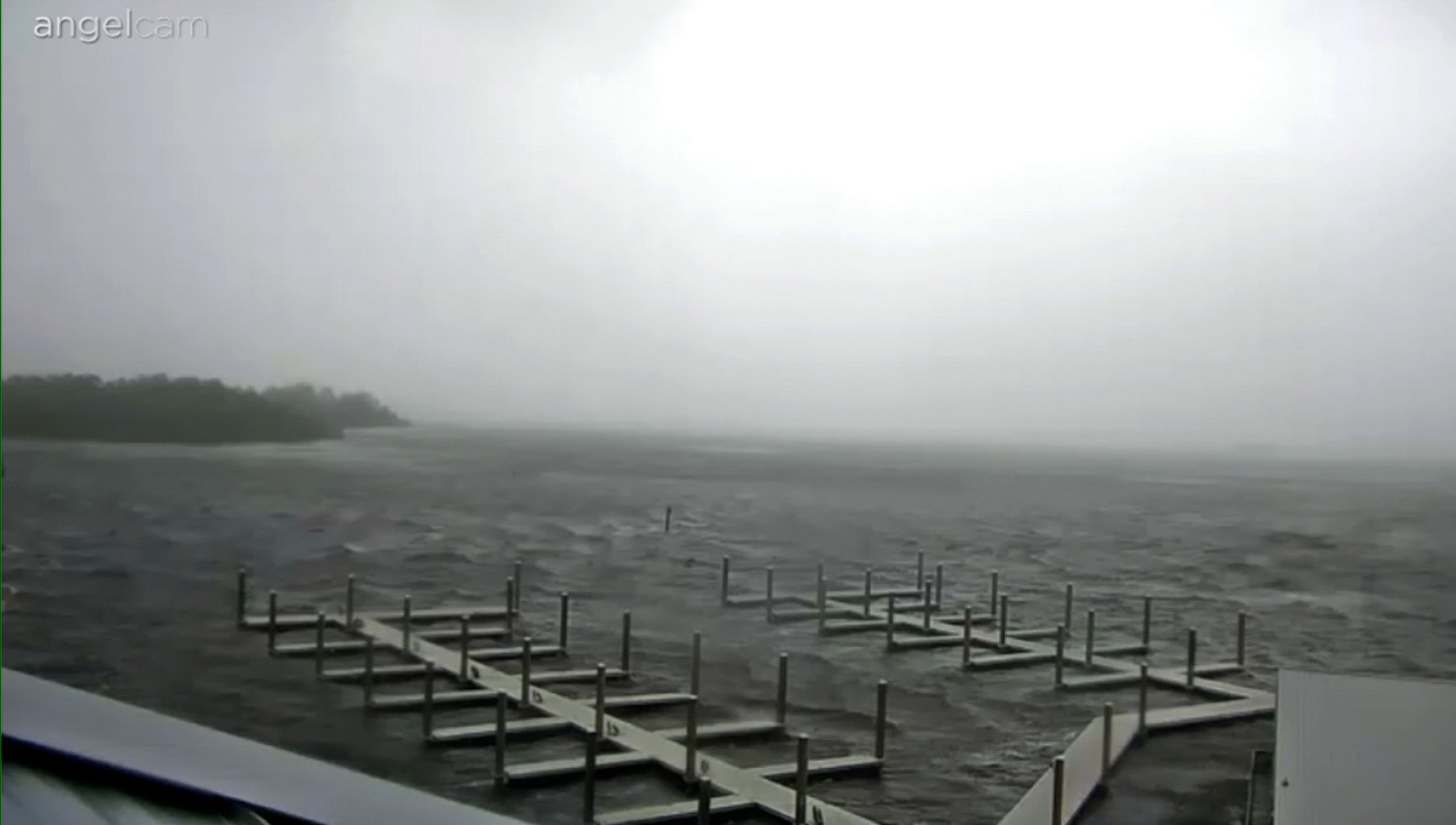 Rain and wind sweep through the Steinhatchee Marina in Steinhatchee, Florida, on Wednesday morning.