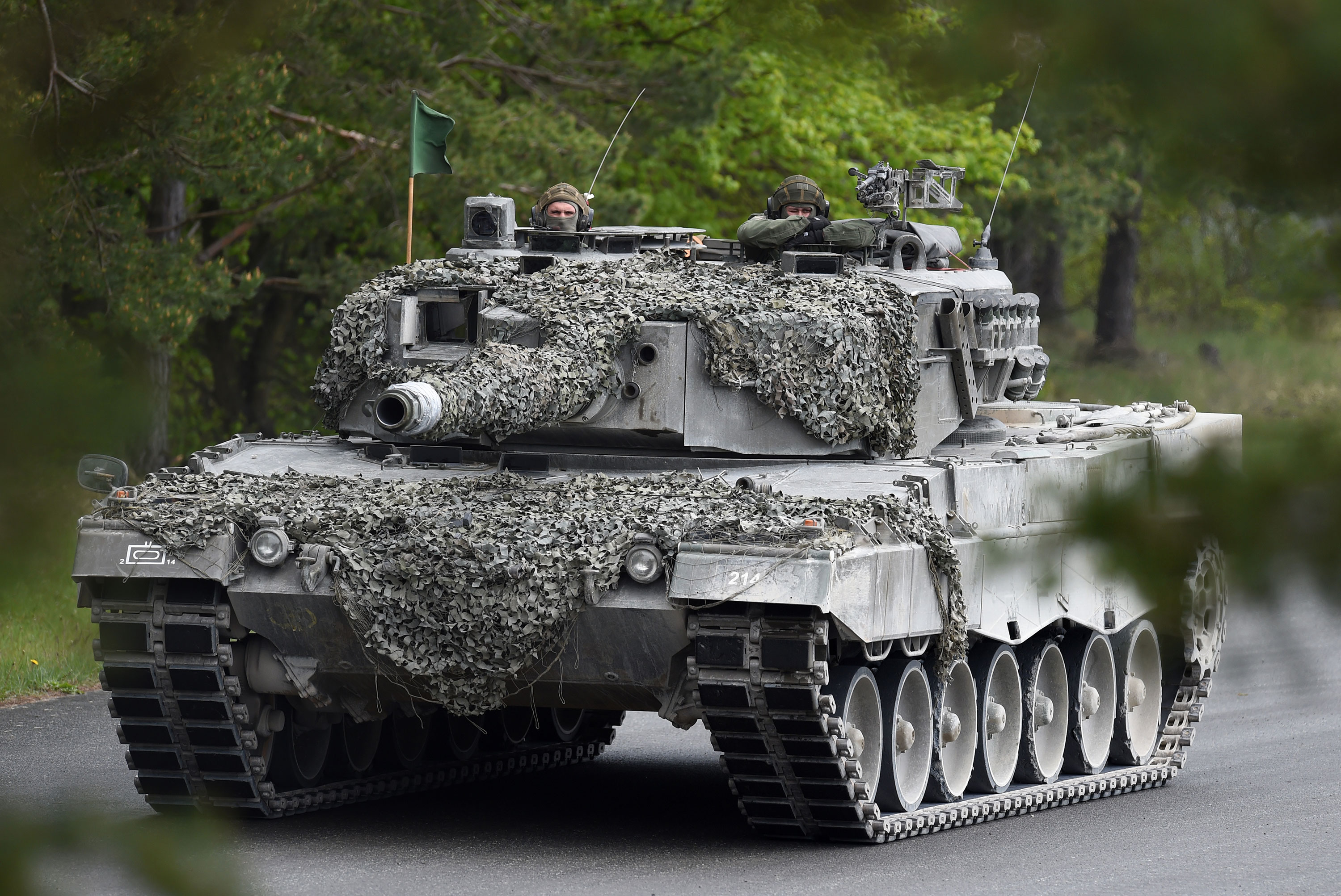 Austrian soldiers drive a Leopard tank at a military exercise in Grafenwoehr, Germany, in 2017.