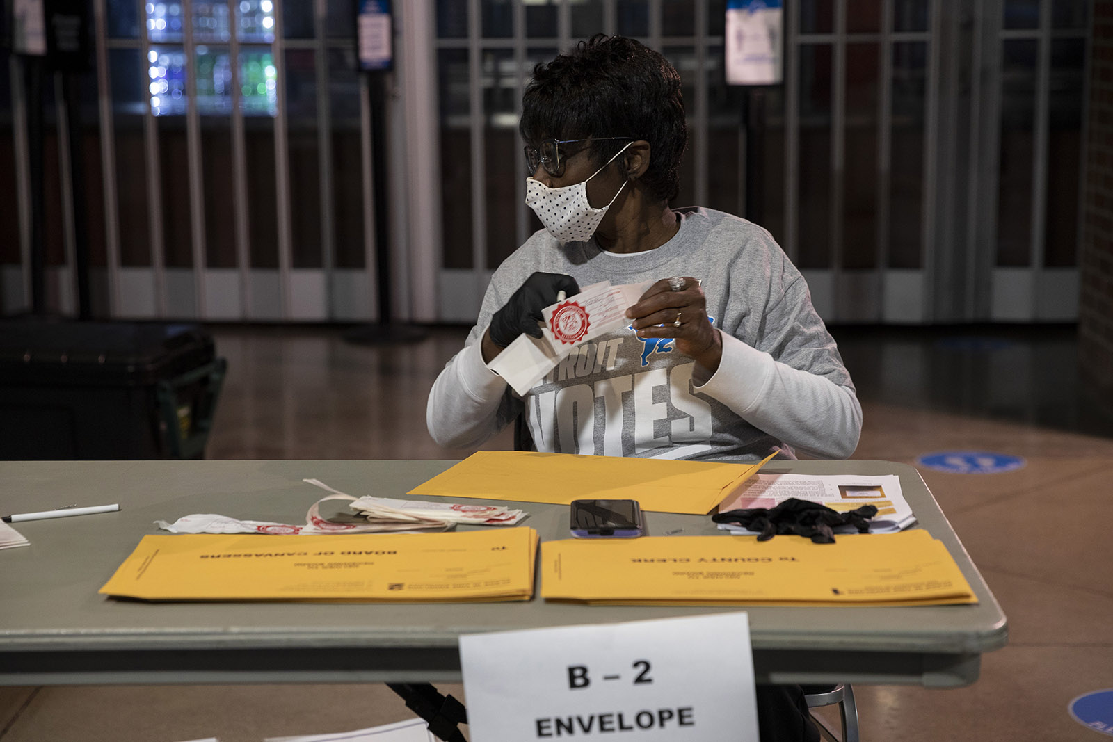 An election worker helps to secure ballots at Ford Field on November 3, in Detroit, Michigan. 
