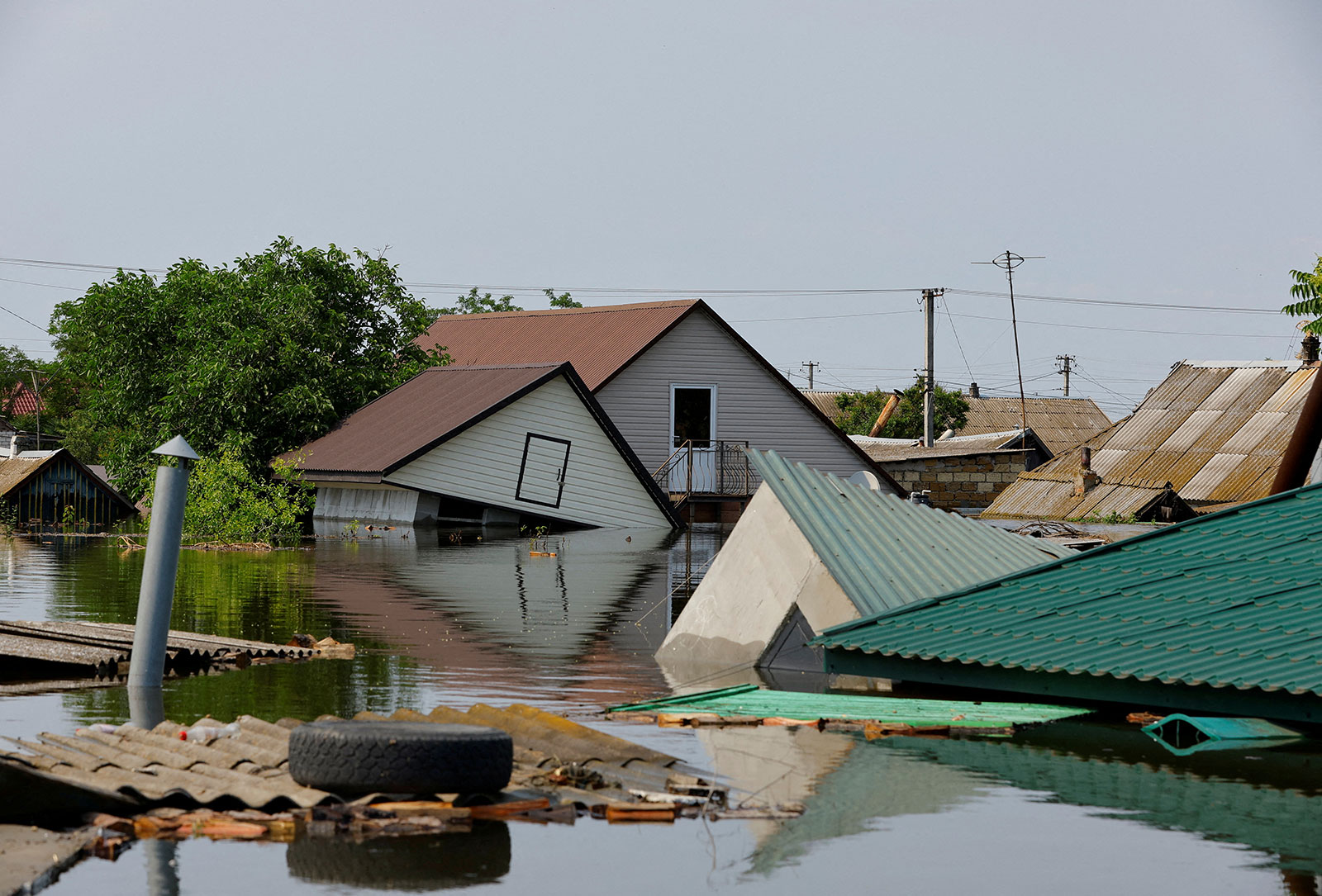 A view shows a flooded residential area following the collapse of the Nova Kakhovka dam in the town of Hola Prystan in the Kherson region, on June 8. 