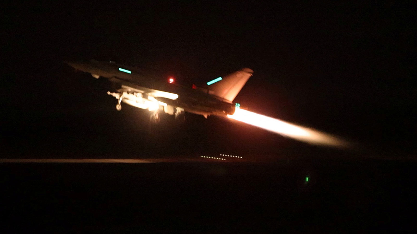 An RAF Typhoon aircraft takes off to join the US-led coalition from RAF Akrotiri to conduct air strikes against military targets in Yemen, aimed at the Iran-backed Houthi militia that has been targeting international shipping in the Red Sea, in Cyprus, in this handout picture released on January 12, local time.