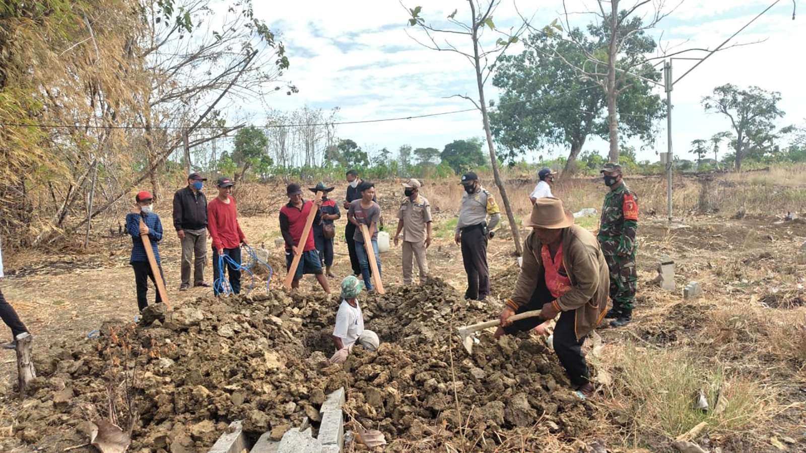 Eight people in Indonesia's Gresik Regency were forced to dig graves as punishment for not wearing masks, according to Head of Cerme Sub-district, Suyono.