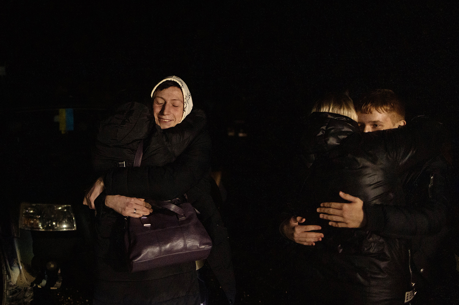 Oleksandr (L), who was kept at a state boarding school in Russian-occupied Lugansk hugs his aunt Viktoria, after he crossed the border from Belarus to Ukraine, in the Volyn region, on February 20.