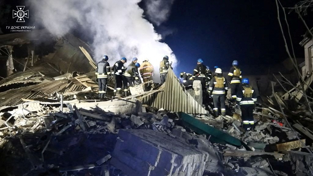 Rescuers work at the site of a maternity ward of a hospital in Vilniansk, Zaporizhzhia region, Ukraine, on November 23, in this still image from video. 