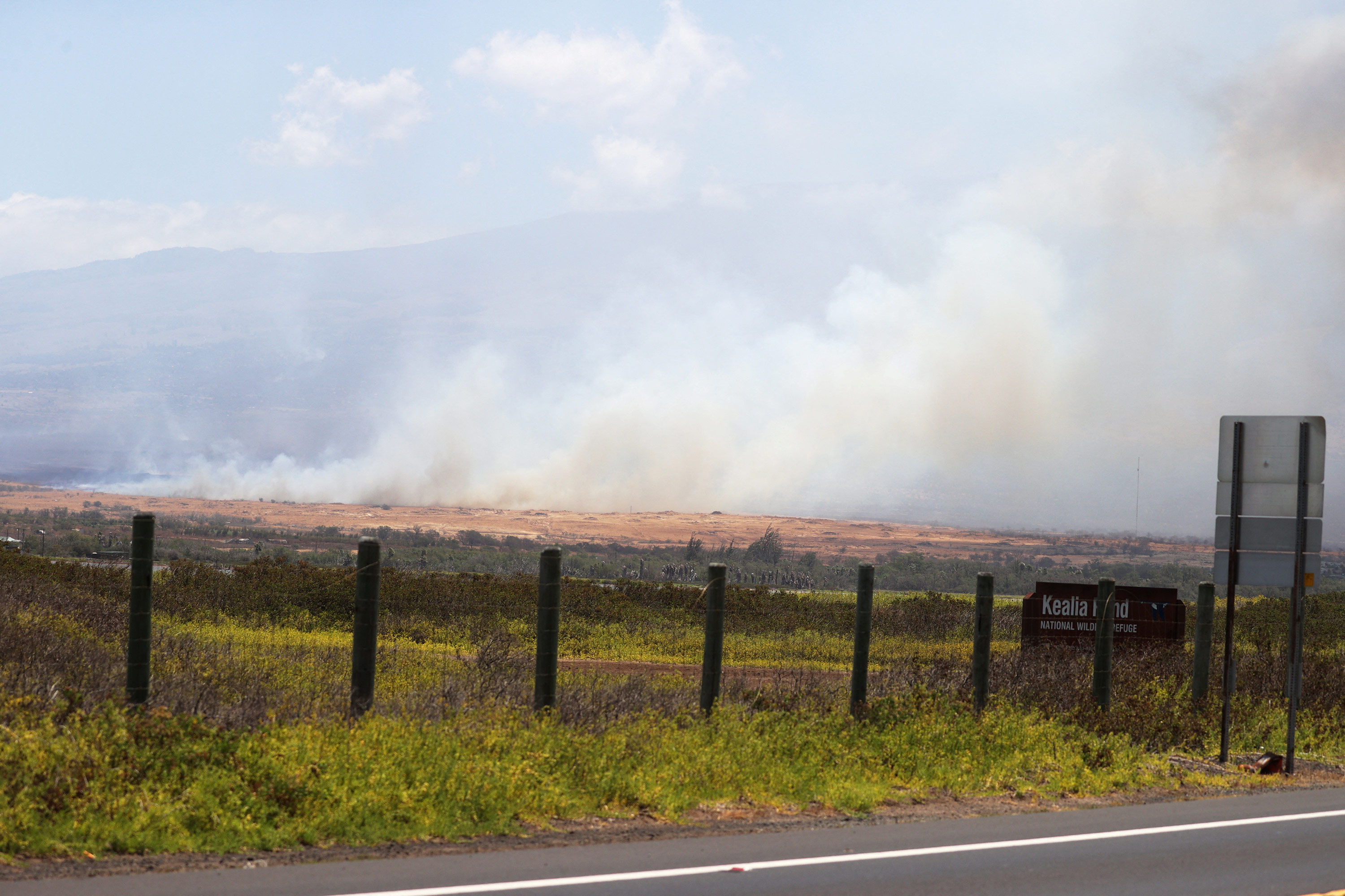 Wildfires seen near Kihei as high winds in Maui are causing multiple fires across the island, in Kahului, Hawaii, on August 9, 2023.