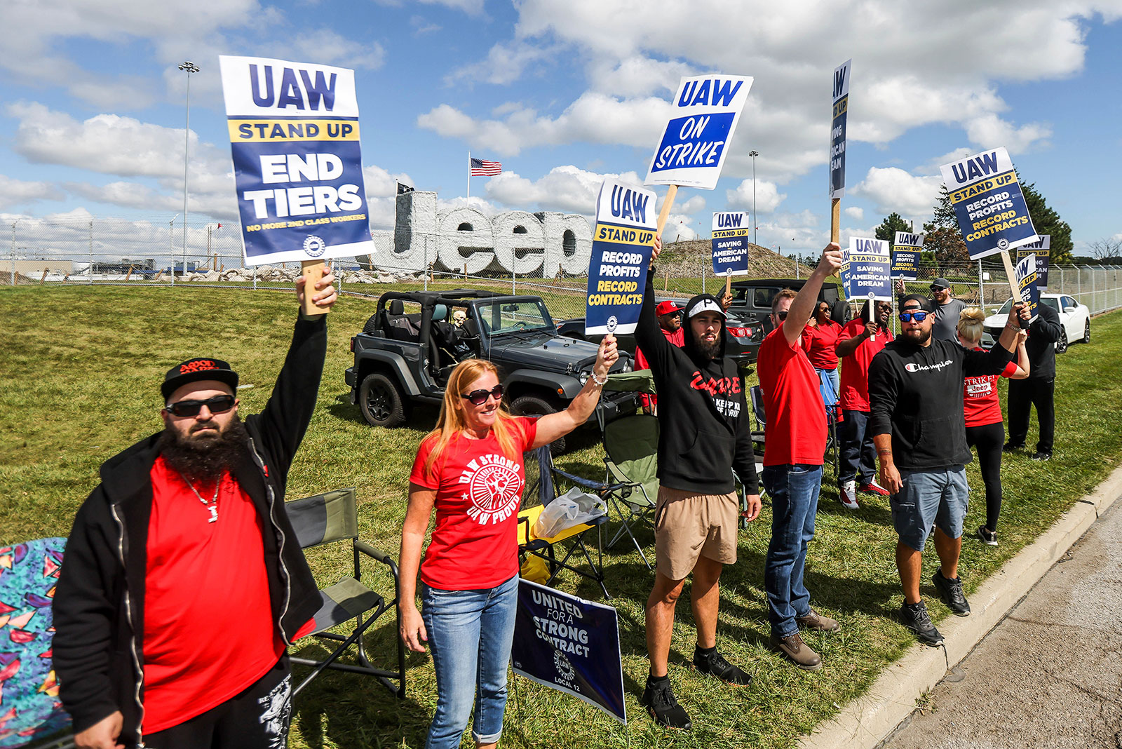 United Auto Workers man the picket line outside the Stellantis Toledo Assembly Complex on Monday, September 18, in Toledo, Ohio.
