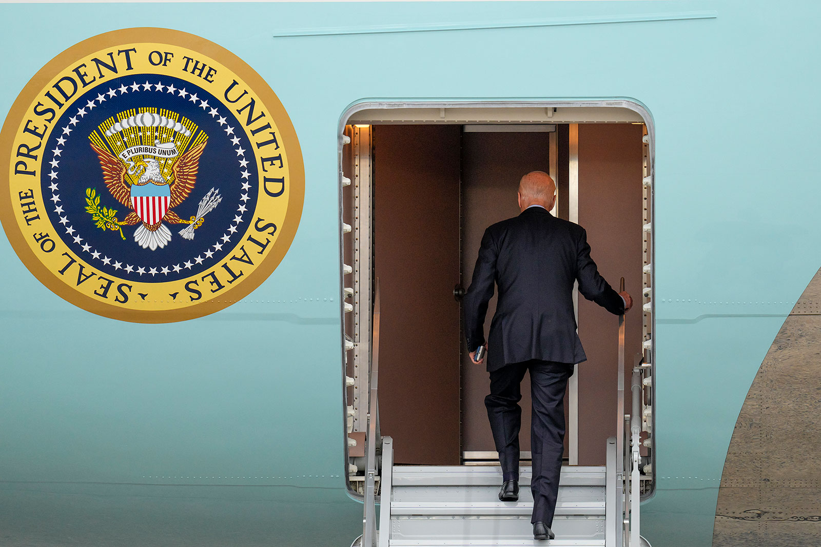 US President Joe Biden boards Air Force One at Andrews Air Force Base in Maryland, Tuesday, October 17, 2023.