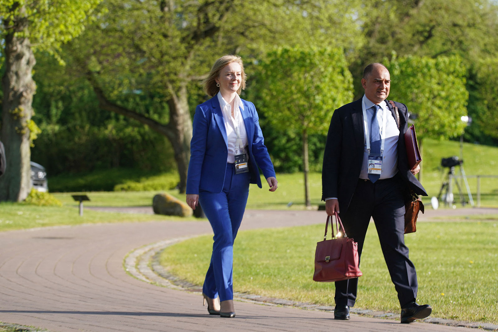 The United Kingdom's Foreign Secretary Liz Truss walks to bilateral talks with her Japanese counterpart at the meeting of the G7 Foreign Ministers in Germany on May 12.
