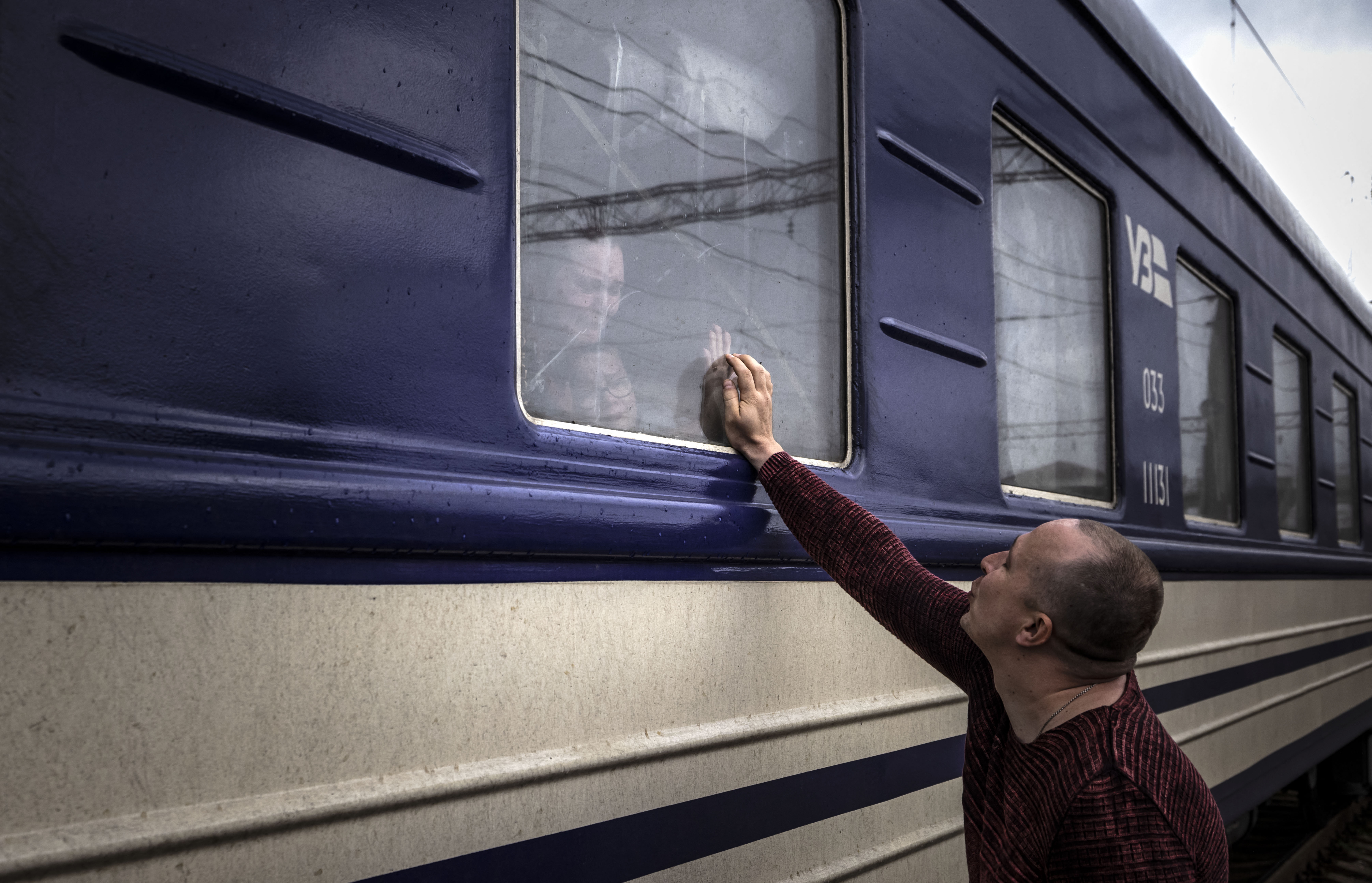 A man says goodbye to family before the train leaves the eastern city of Kramatorsk, in the Donbas region of Ukraine, on April 3.
