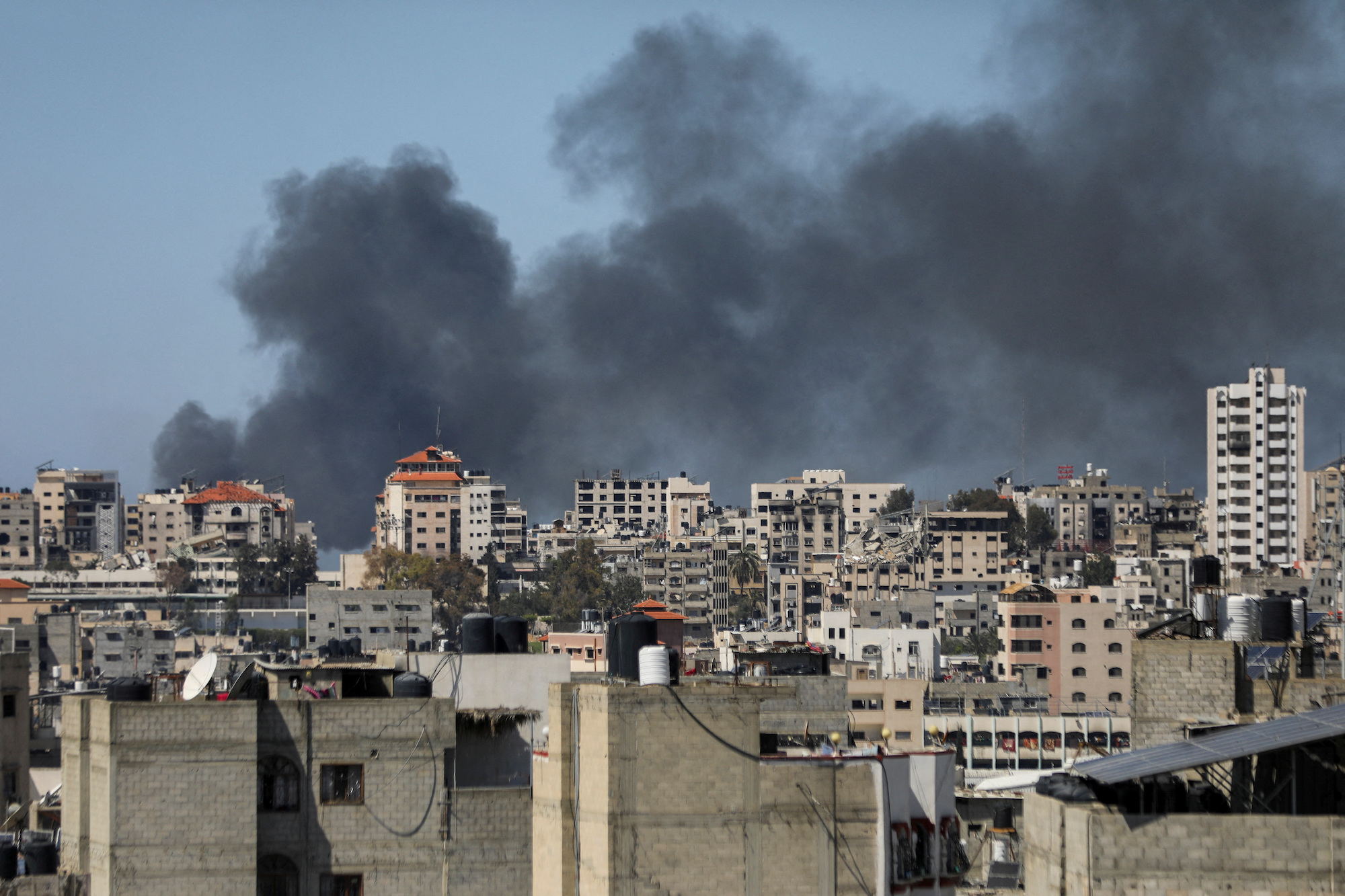 Smoke rises during an Israeli raid at Al-Shifa hospital and the area around it in Gaza City, on March 20.