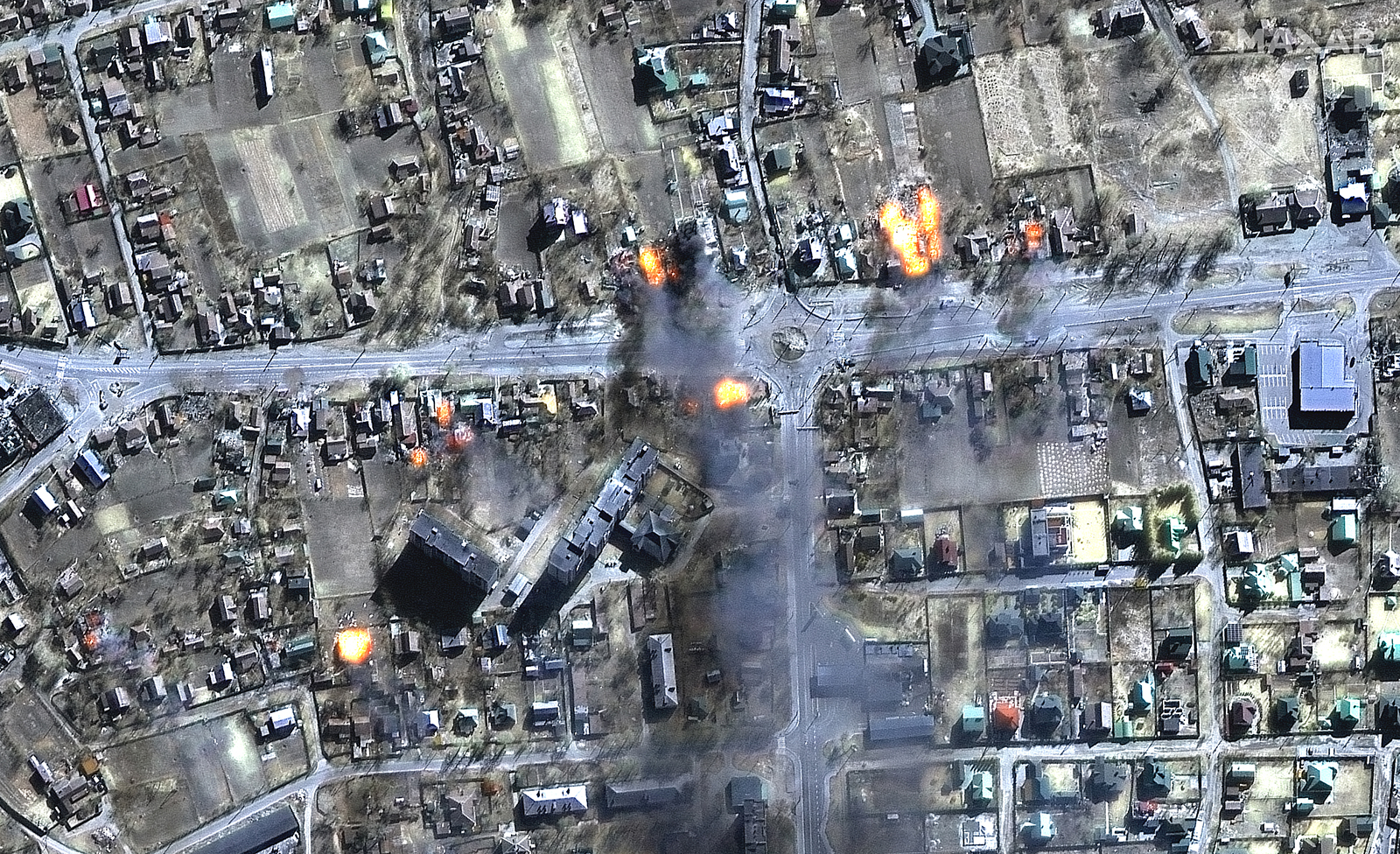 A satellite image shows burning homes in a residential area of Chernihiv, Ukraine, on March 16.
