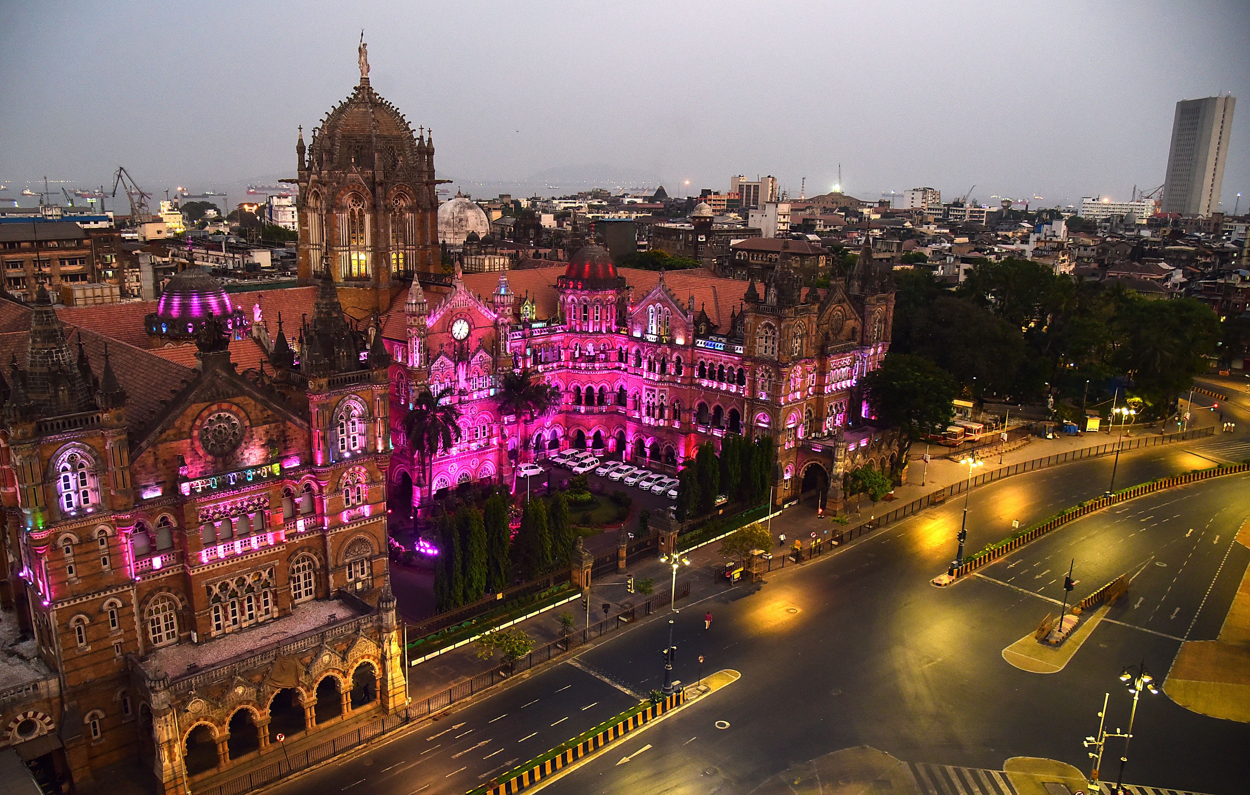 The Chhatrapati Shivaji Terminus train station is illuminated among deserted roads during a government-imposed nationwide lockdown in Mumbai, India, on April 11.