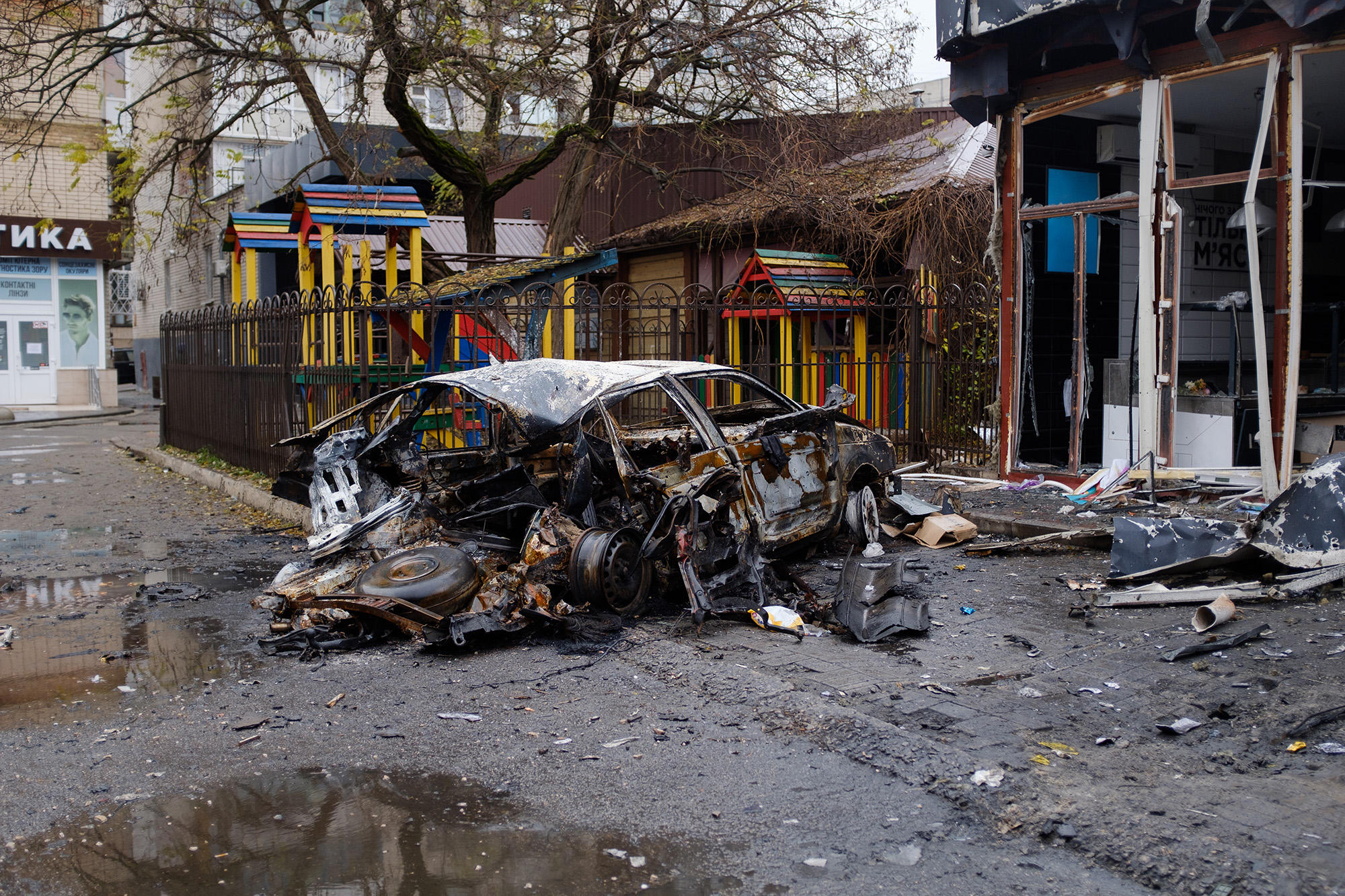 The site of a Russian shelling in Kherson where four were killed, according to the local administration.