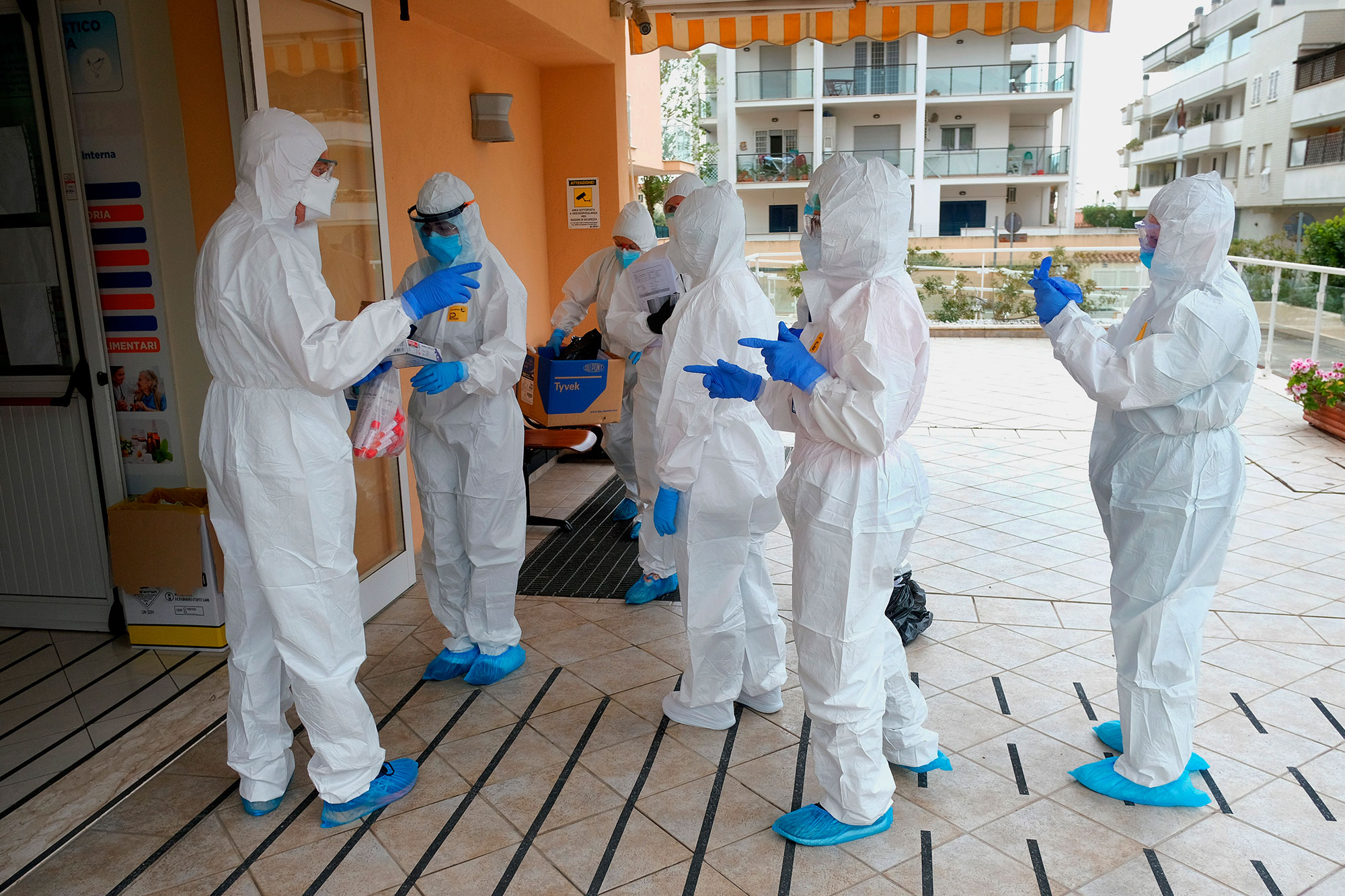 Volunteer doctors prepare to administer coronavirus tests at a nursing home in Santa Marinella, Italy, on April 21.