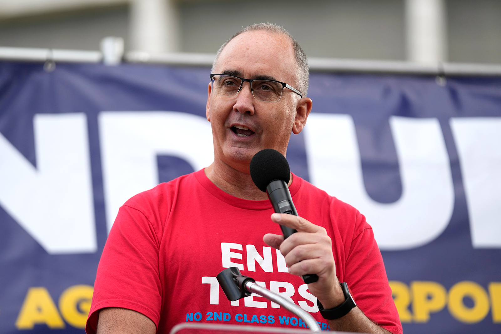 United Auto Workers President Shawn Fain speaks at a rally in Detroit, Michigan, on Friday, September 15. 