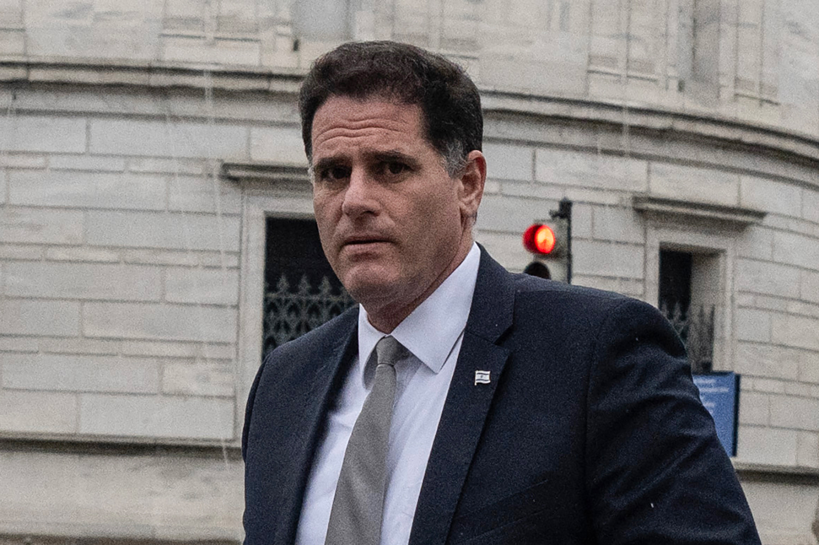 Ron Dermer walks into the Executive Office Building in Washington, DC on December 26.