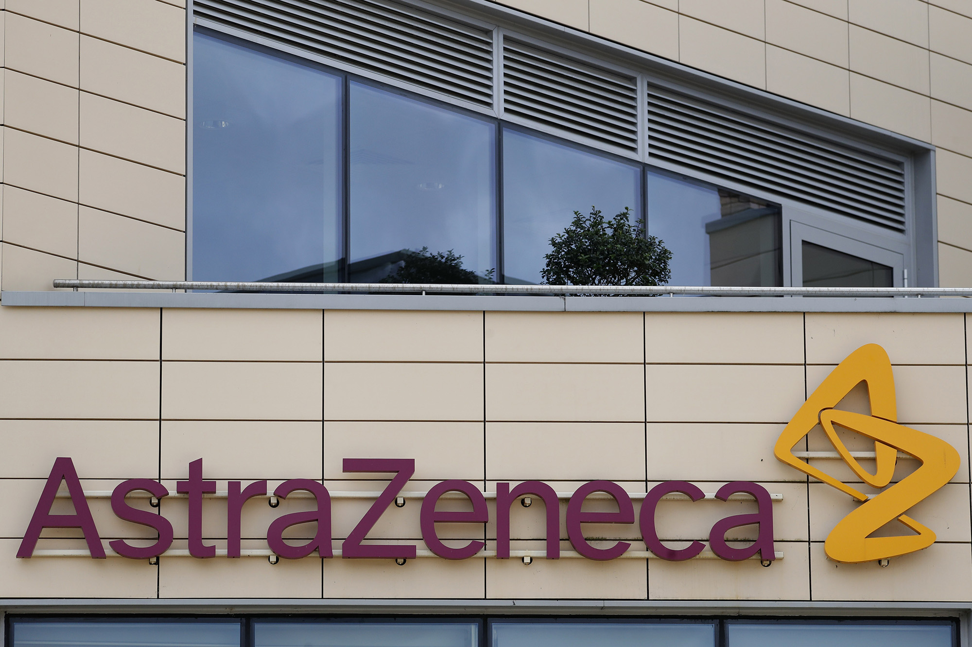 A general view of AstraZeneca offices and the corporate logo in Cambridge, England. 