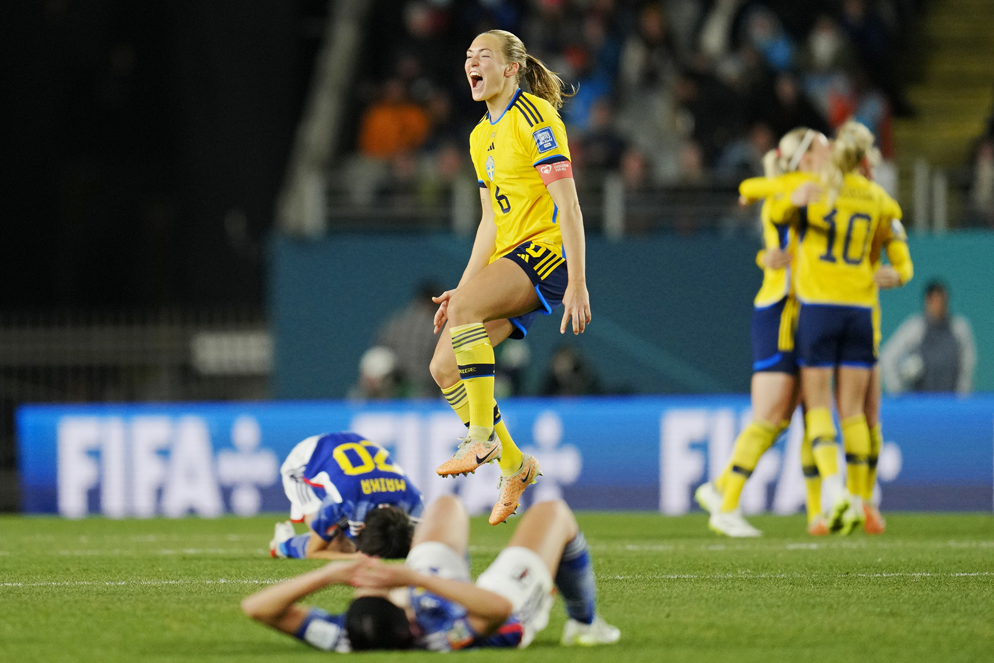 Sweden's Magdalena Eriksson celebrates at the end of the Women's World Cup quarterfinal soccer match between Japan and Sweden at Eden Park in Auckland, New Zealand.