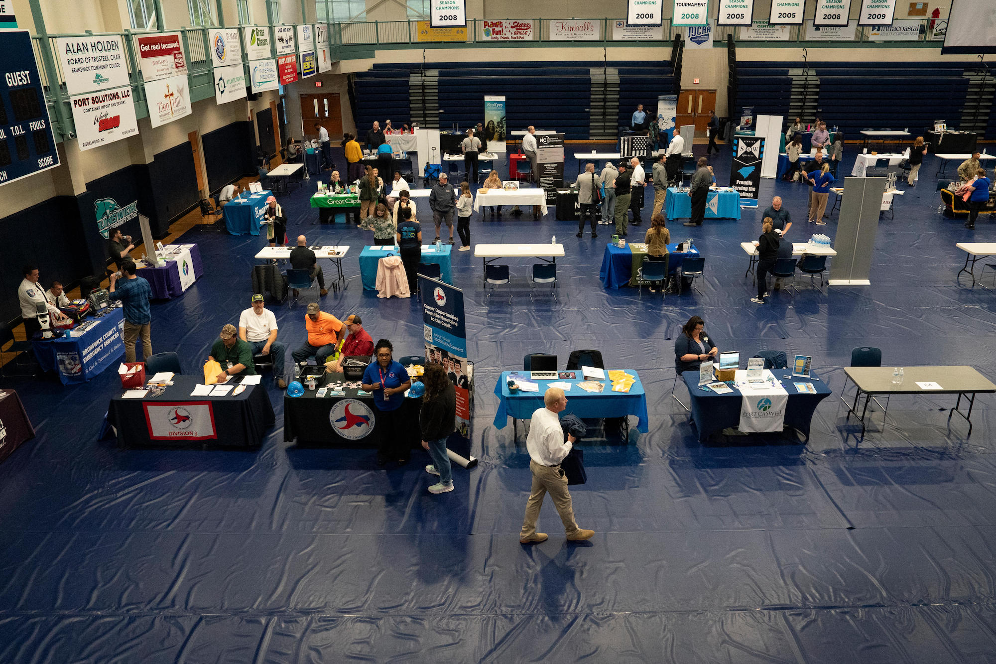 Jobseekers and representatives at a job fair at Brunswick Community College are seen in Bolivia, North Carolina, on April 11.