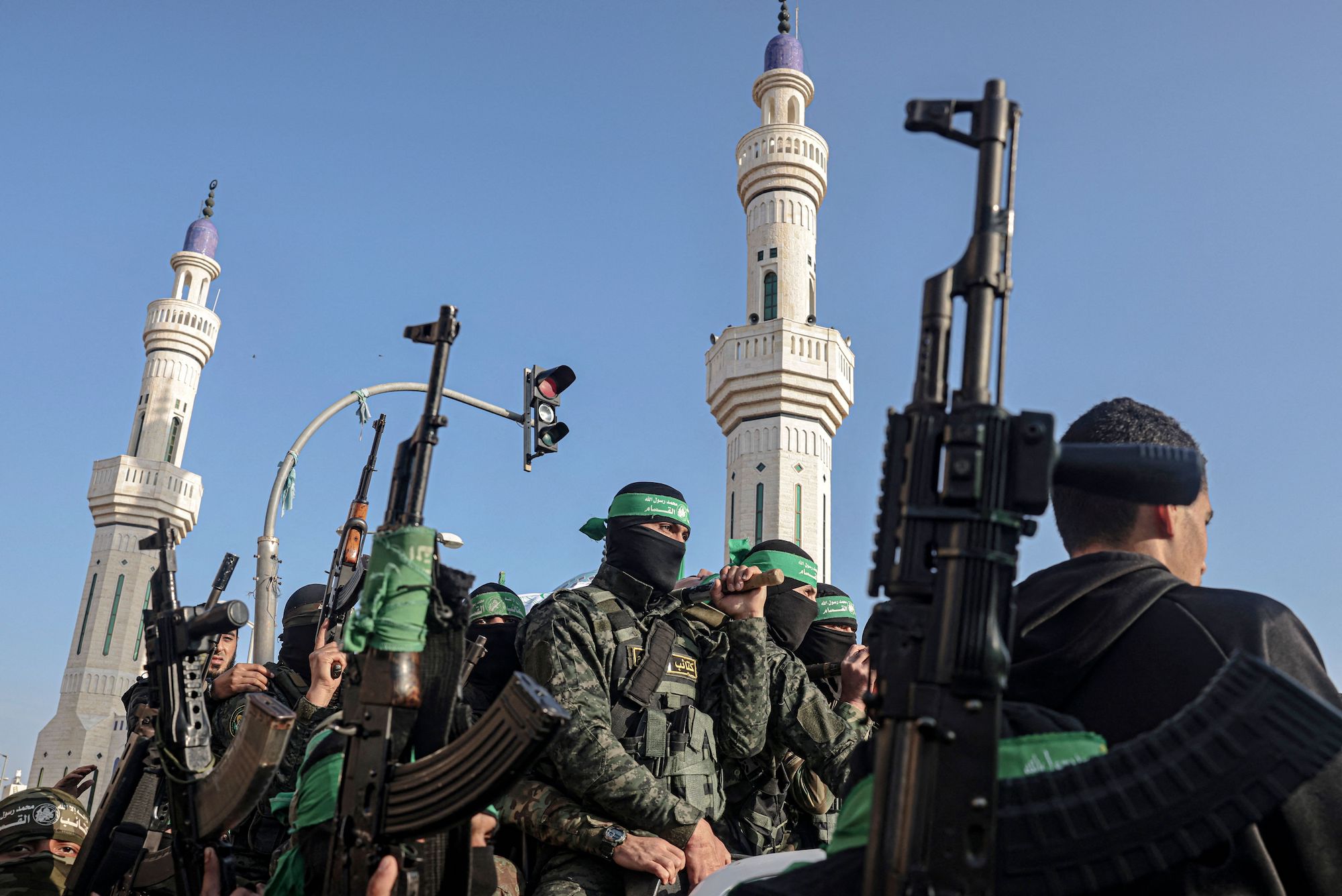 Hamas members attend a funeral in Rafah, southern Gaza, on February 16, 2022.