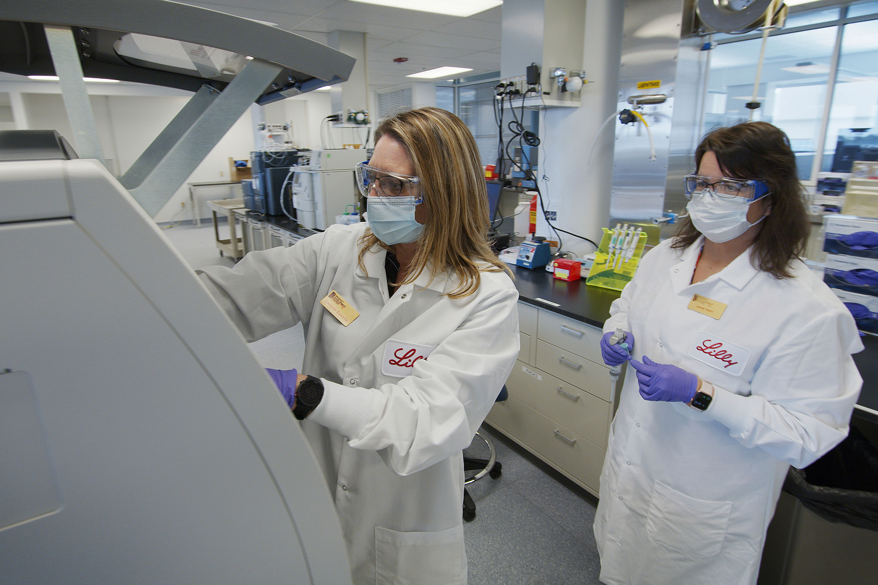 Researchers prepare mammalian cells to produce possible Covid-19 antibodies for testing in a laboratory in May in Indianapolis, Indiana. 