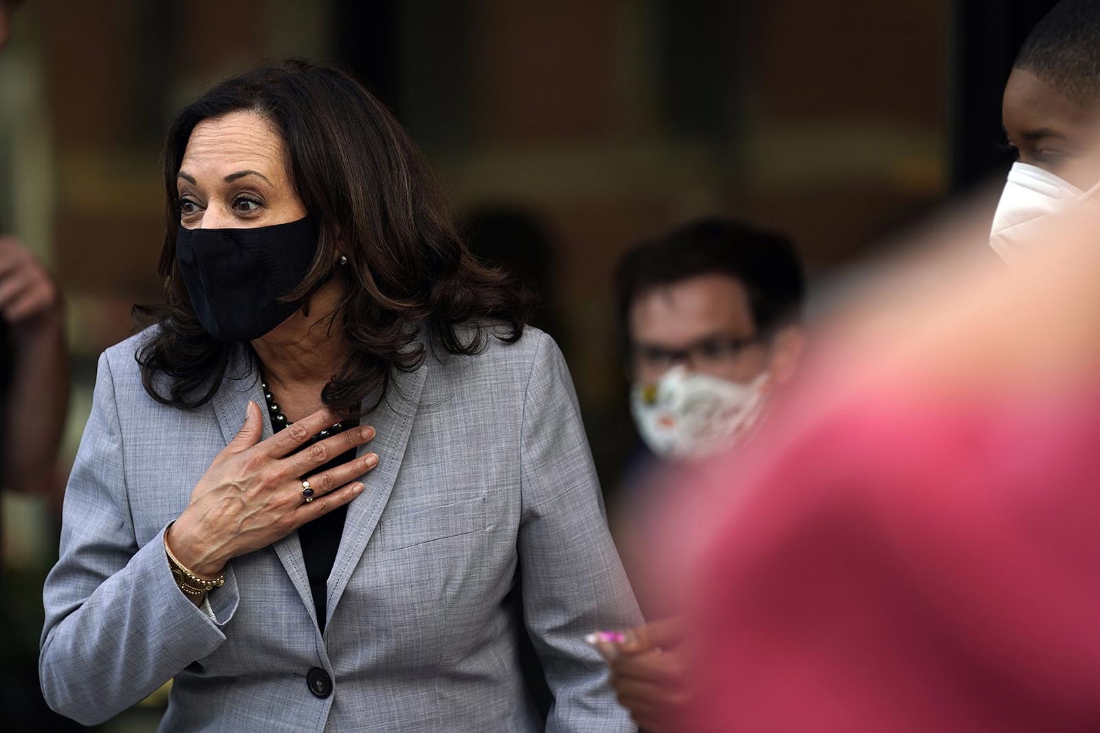 Democratic vice presidential candidate Sen. Kamala Harris, greets diners at Trophy Brewing and Pizza during a campaign visit in Raleigh, North Carolina, on Monday, September 28. 