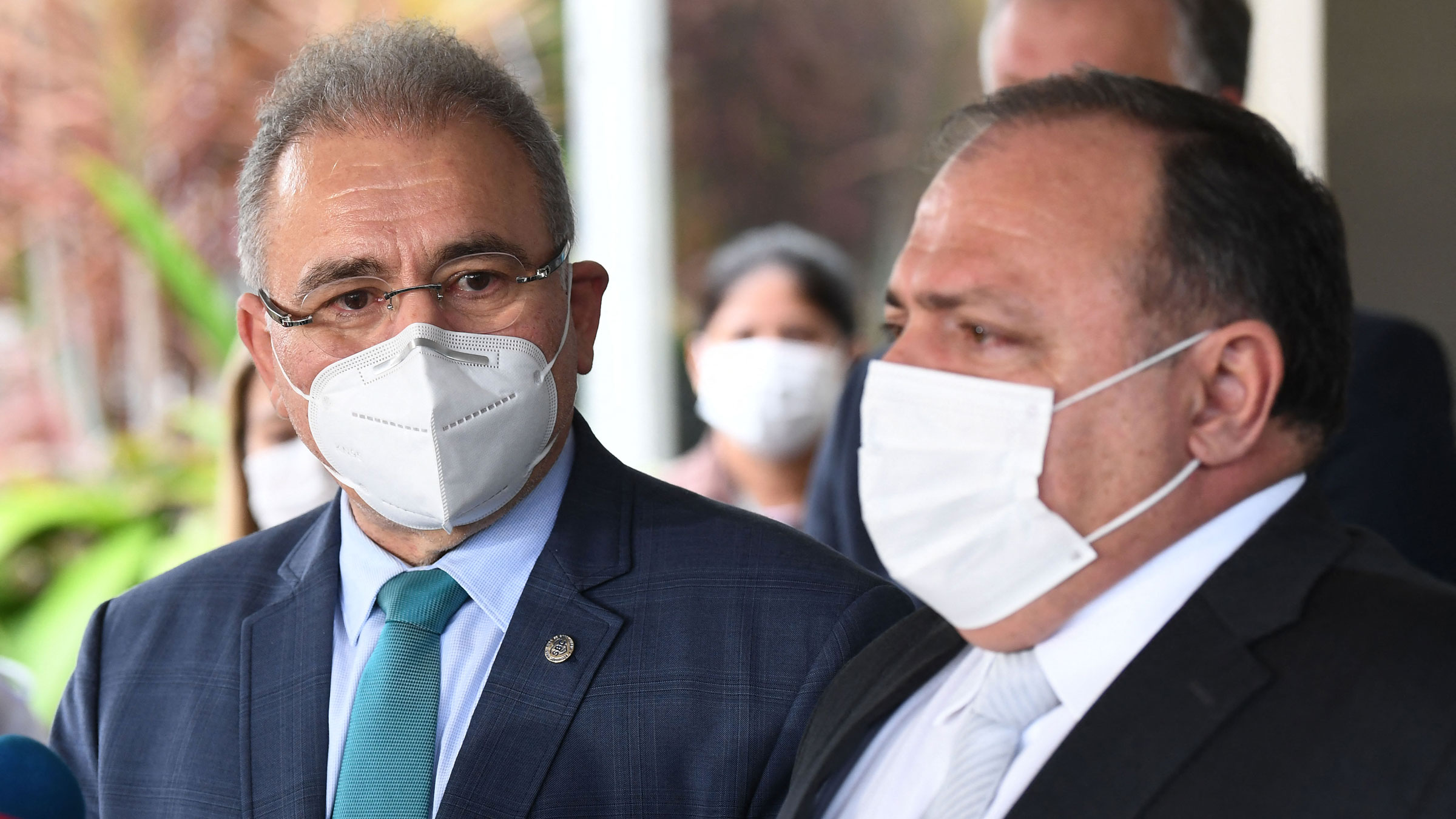 Dr. Marcelo Queiroga, left, succeeded Eduardo Pazuello, right, as Brazil's minister of health on Tuesday.