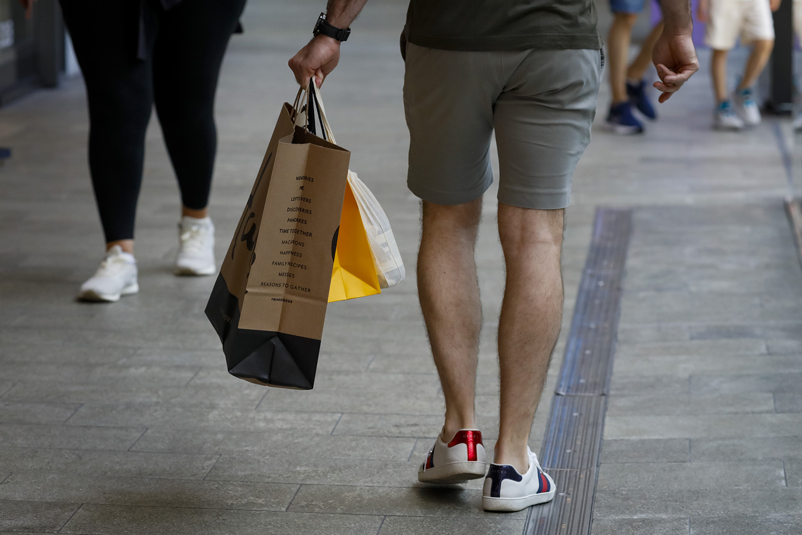 A shopper carries retail bags in Miami, Florida, on June 14.