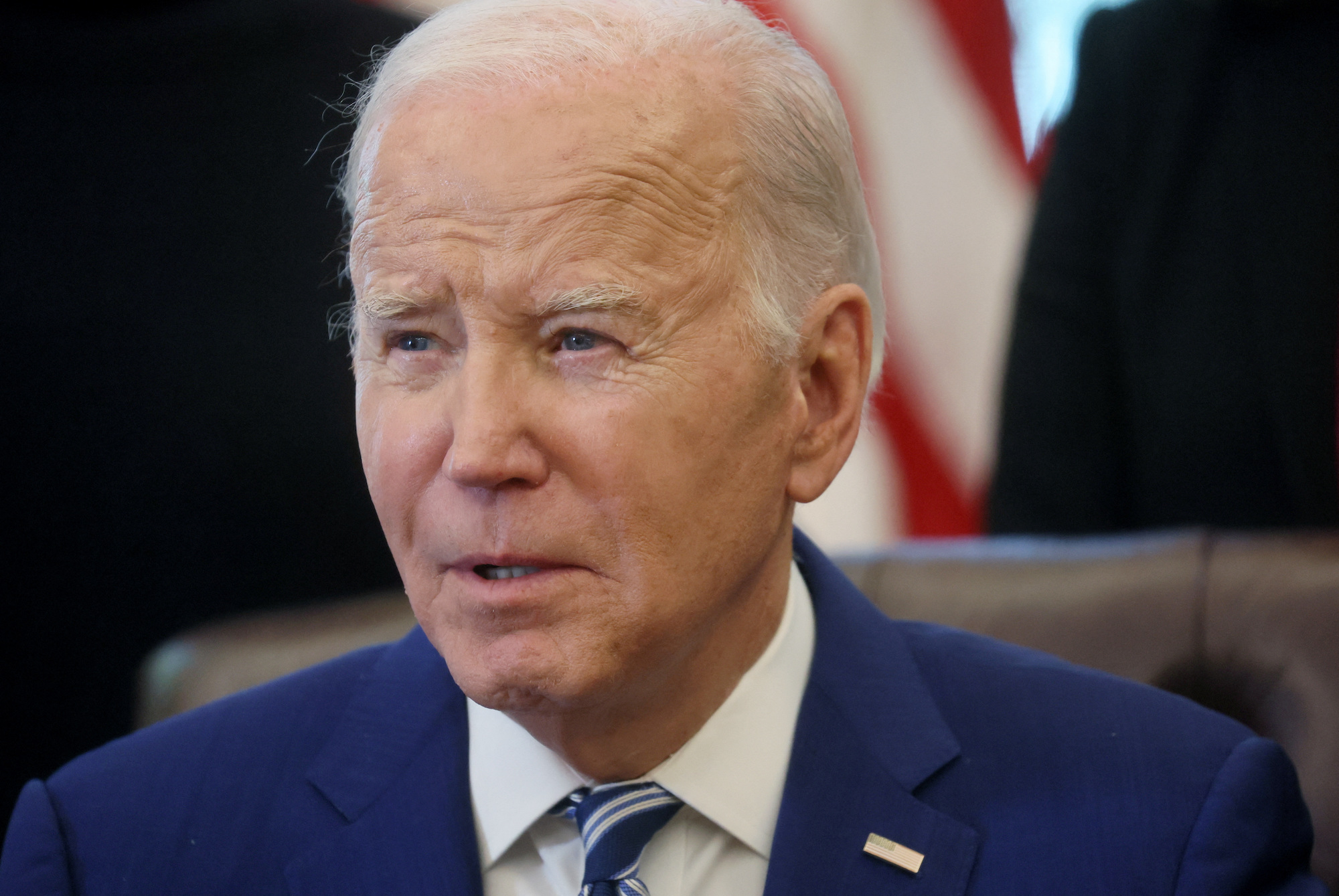 President Joe Biden answers questions from the press at the White House on Monday.
