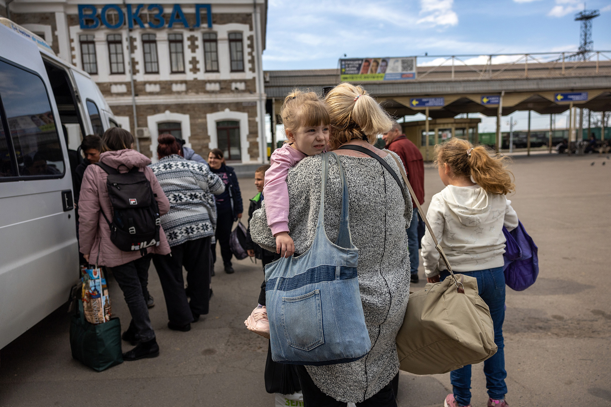 Ukrainians displaced from frontline areas arrive at a train station for onward travel to western Ukraine on May 3, in Kryvyi Rih, Ukraine.