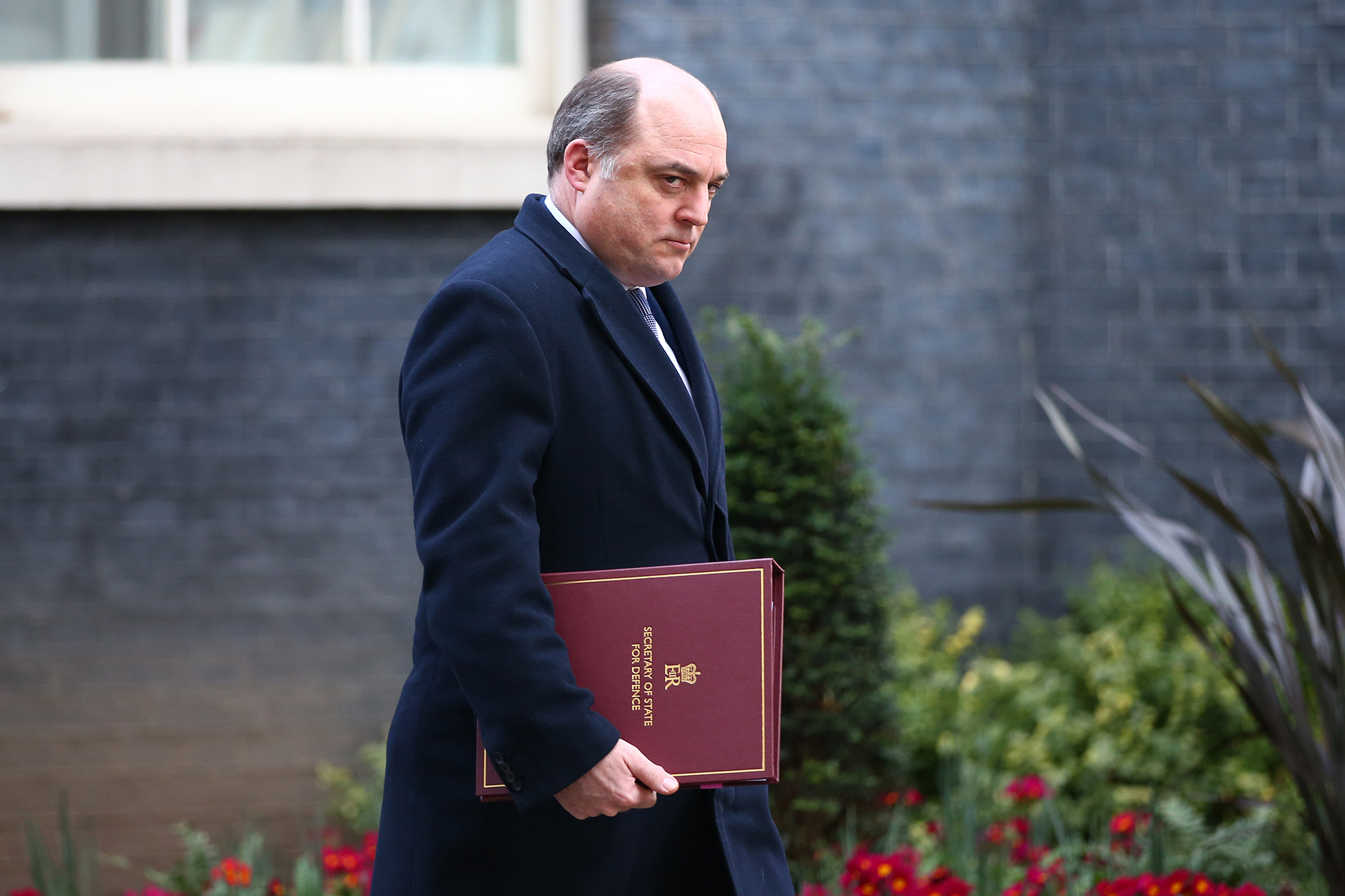 Secretary of State for Defence Ben Wallace leaves Downing Street after attending a weekly cabinet meeting on March 8, in London, England.