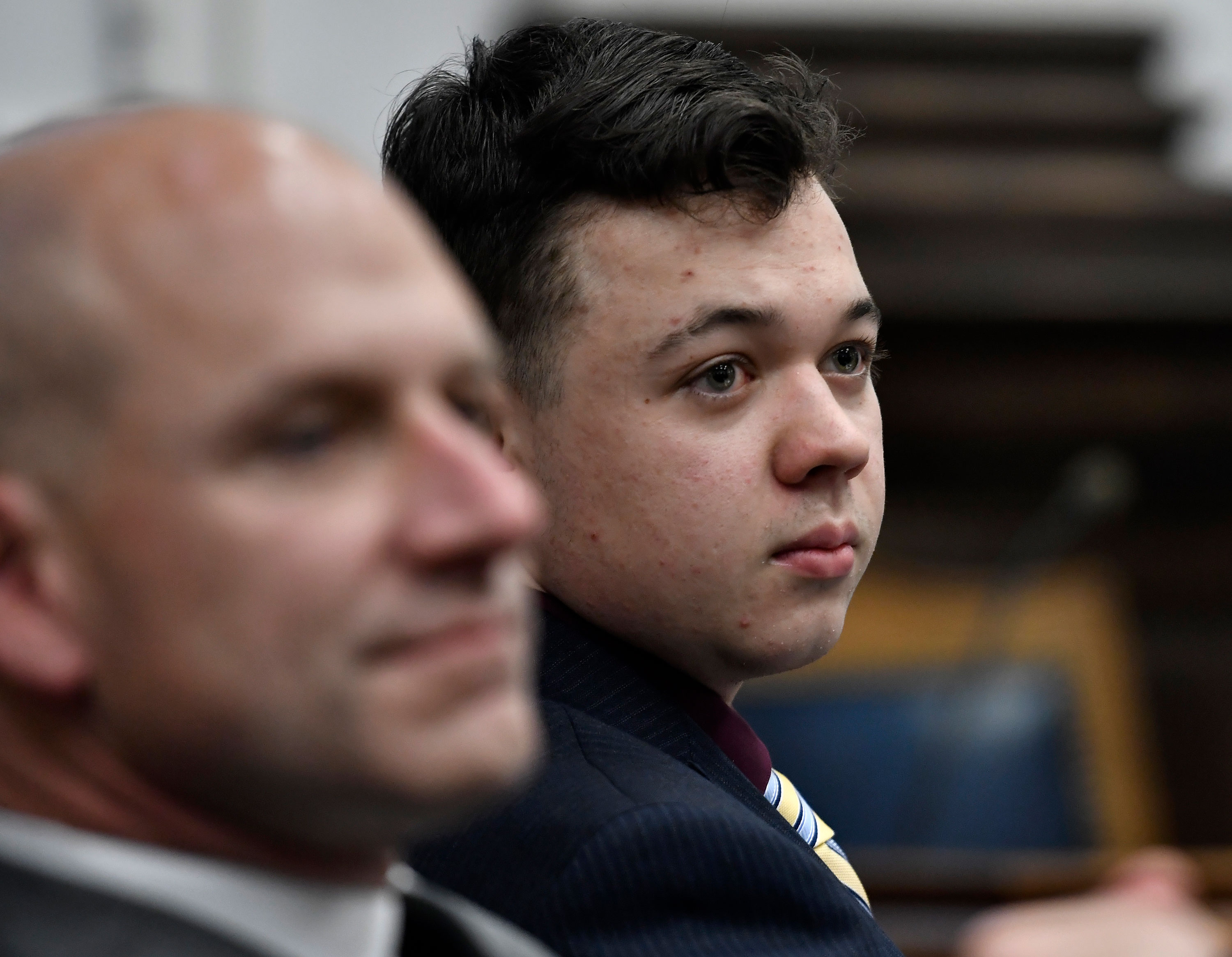 Kyle Rittenhouse and his attorney Corey Chirafisi listen during his trial in Kenosha, Wisconsin, on Thursday.