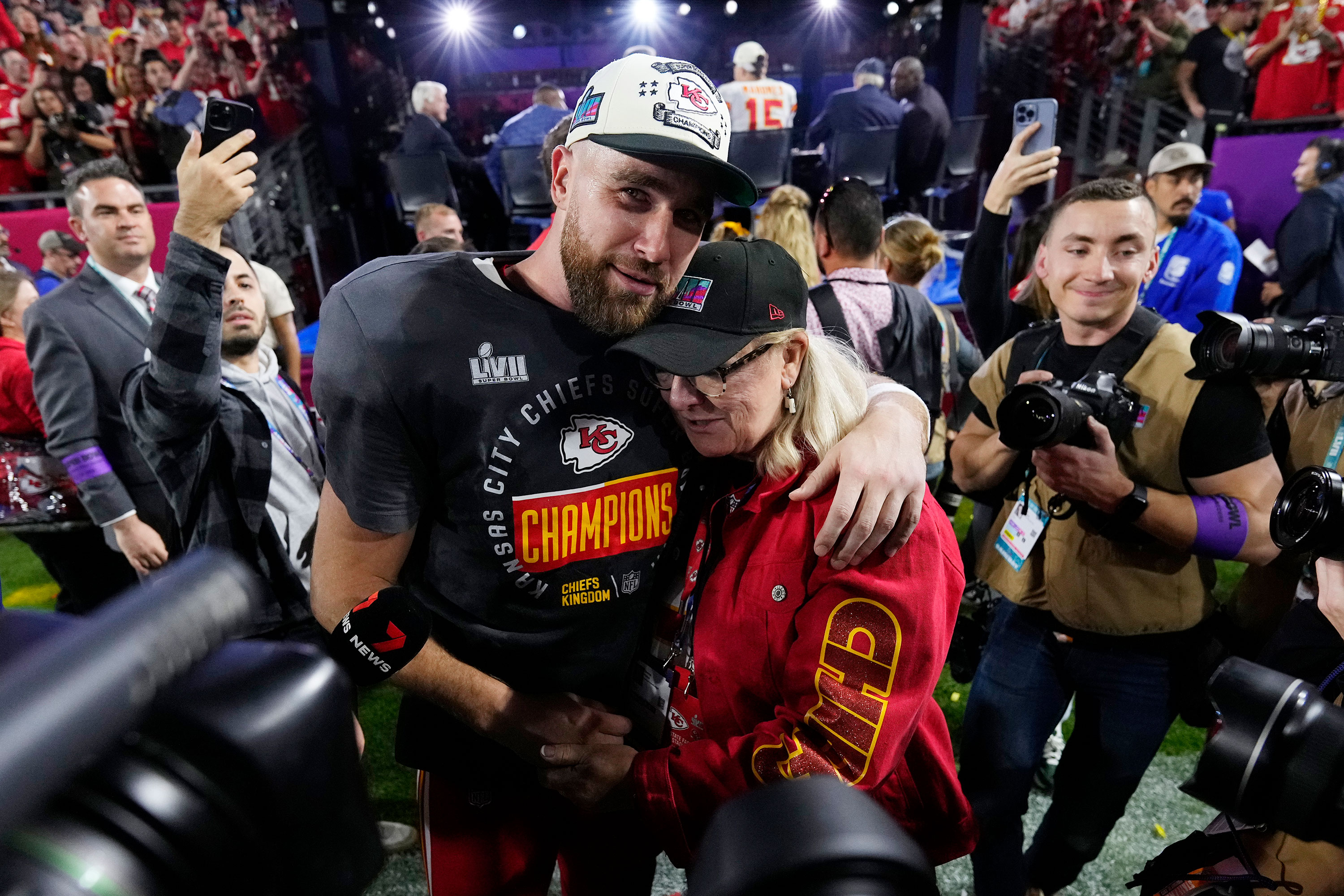 Travis Kelce hugs his mother Donna after the game.