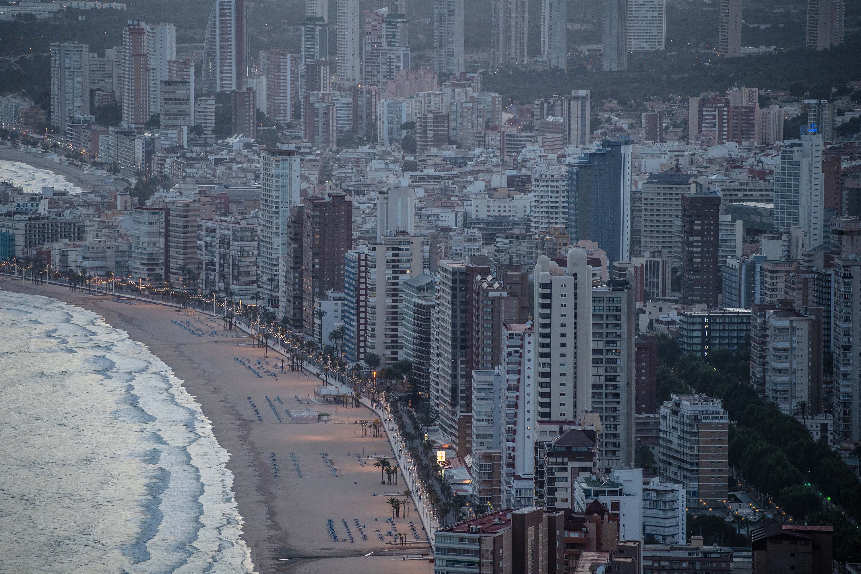 A view of apartment towers at dusk in Benidorm, Spain, on Sunday, May 11. 