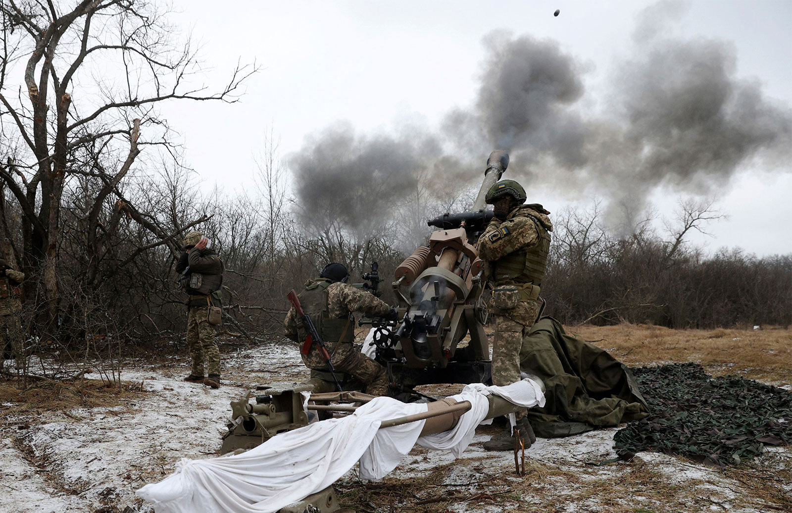 Ukrainian artillerymen fire an L119 howitzer towards Russian positions at a front line in the Luhansk region on January 16. 