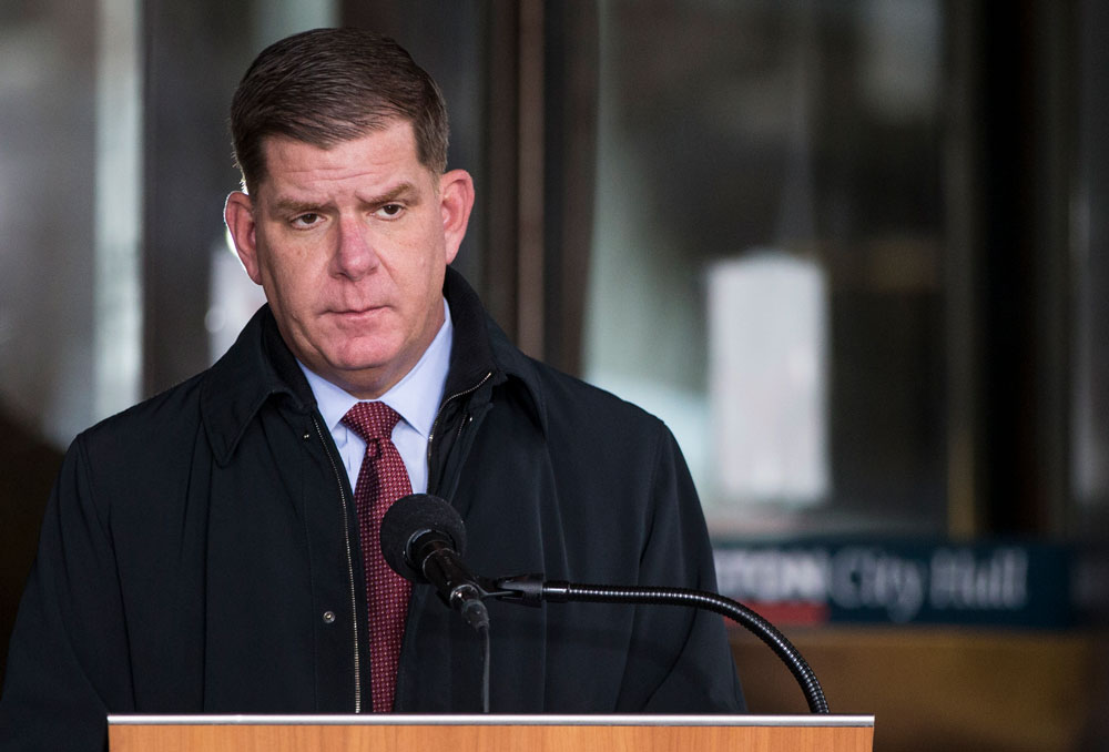 Mayor Marty Walsh gives his daily press conference on the steps of Boston City Hall on April 20.