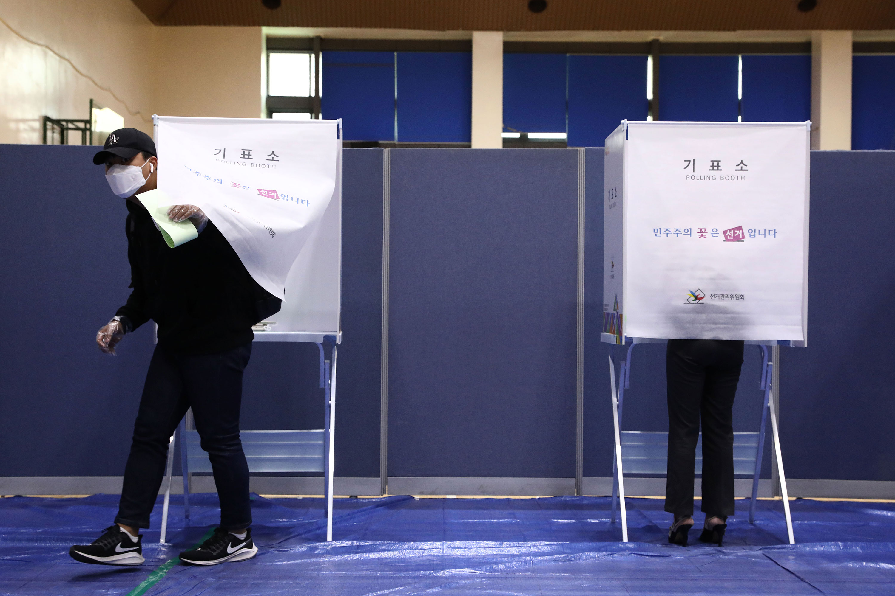 Voters cast their ballots for the Parliamentary election in Seoul, South Korea on April 15. 