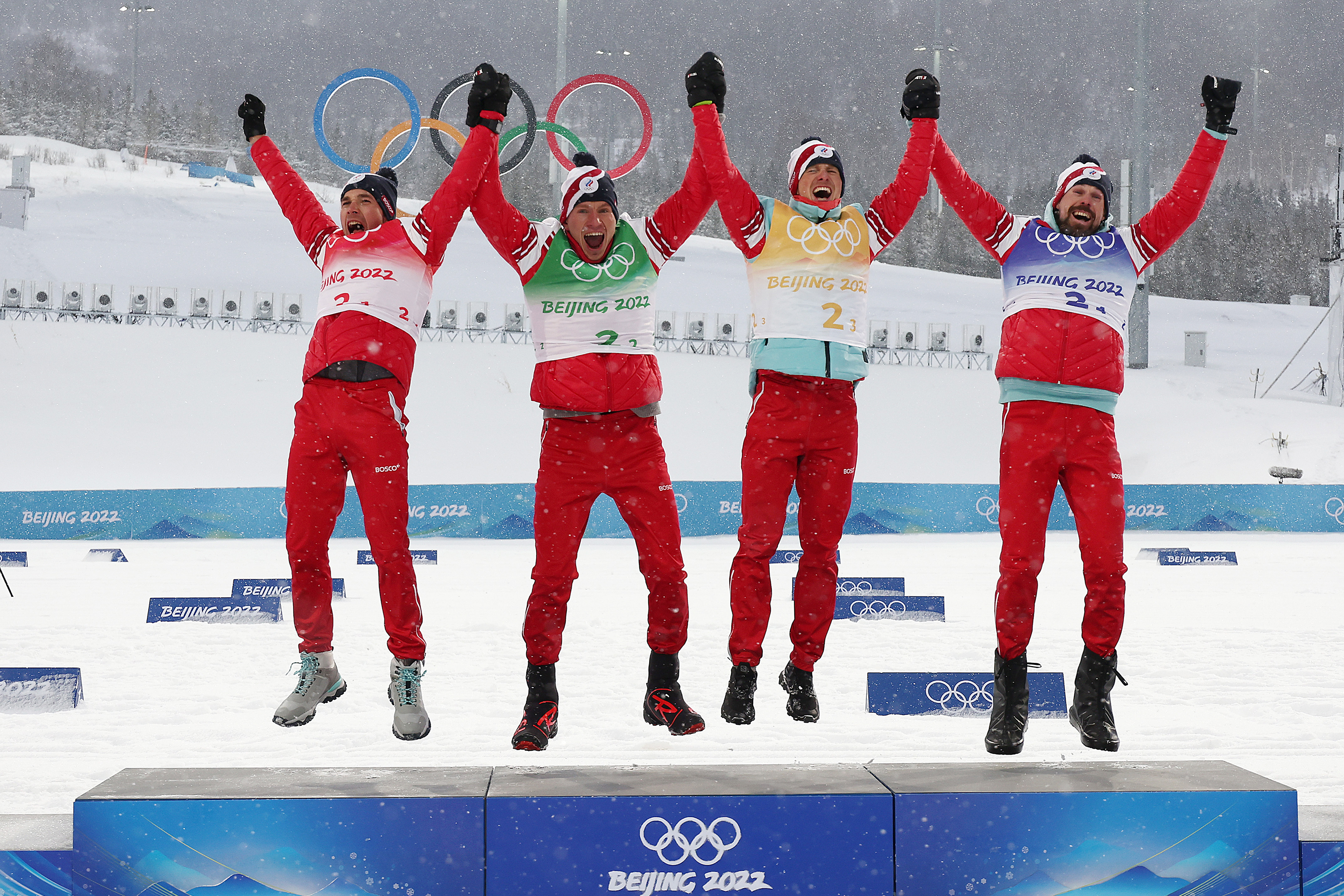 Team ROC celebrates after winning the men's cross-country skiing 4x10km relay on Feb. 13.