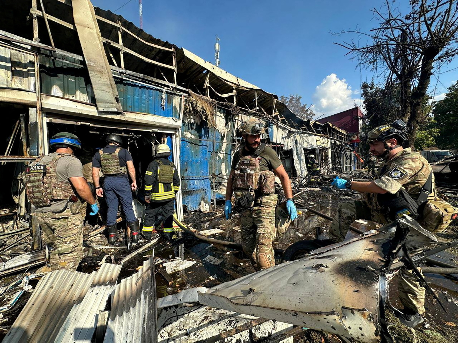 Police officers and rescuers inspect the site of a Russian military strike in Kostiantynivka, Donetsk region, Ukraine September 6.