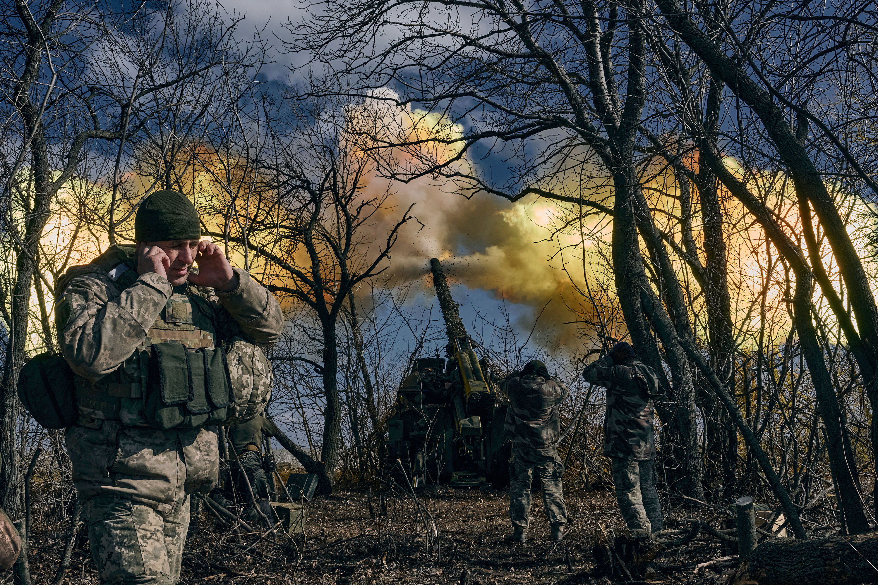 Ukrainian soldiers fire a self-propelled howitzer towards Russian positions near Bakhmut on March 5. 