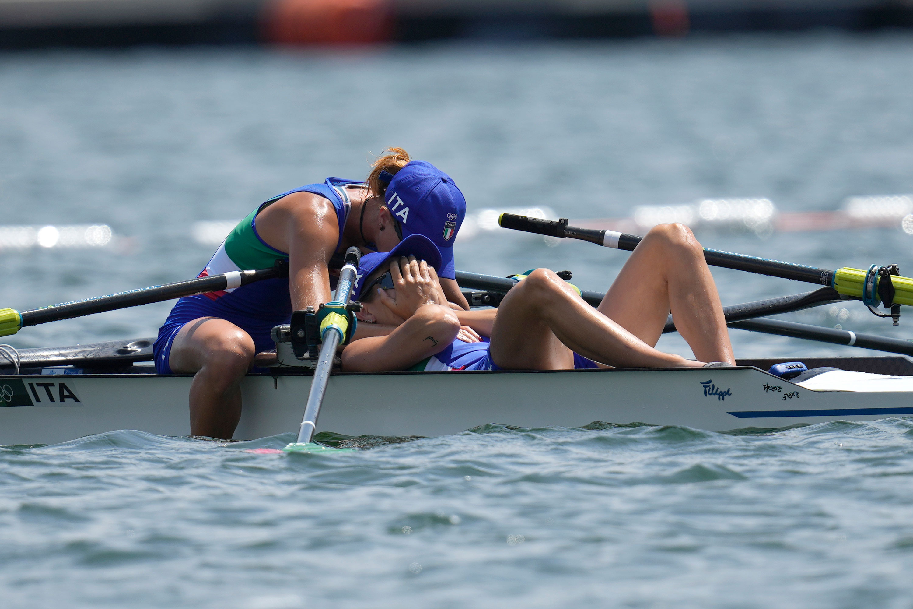 Italy's Valentina Rodini and Federica Cesarini react after winning gold in the lightweight rowing double sculls on July 29.