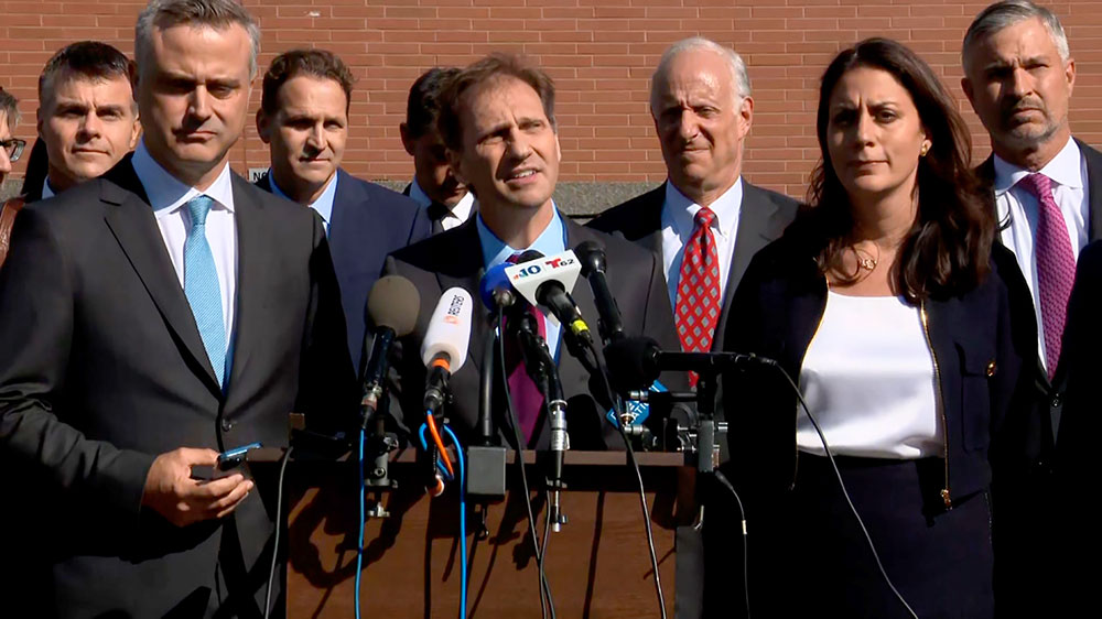 Dominion attorney Justin Nelson speaks during a press conference.