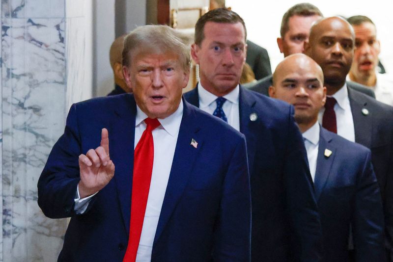 Donald Trump speaks as he leaves court on Tuesday, October 3, 2023.