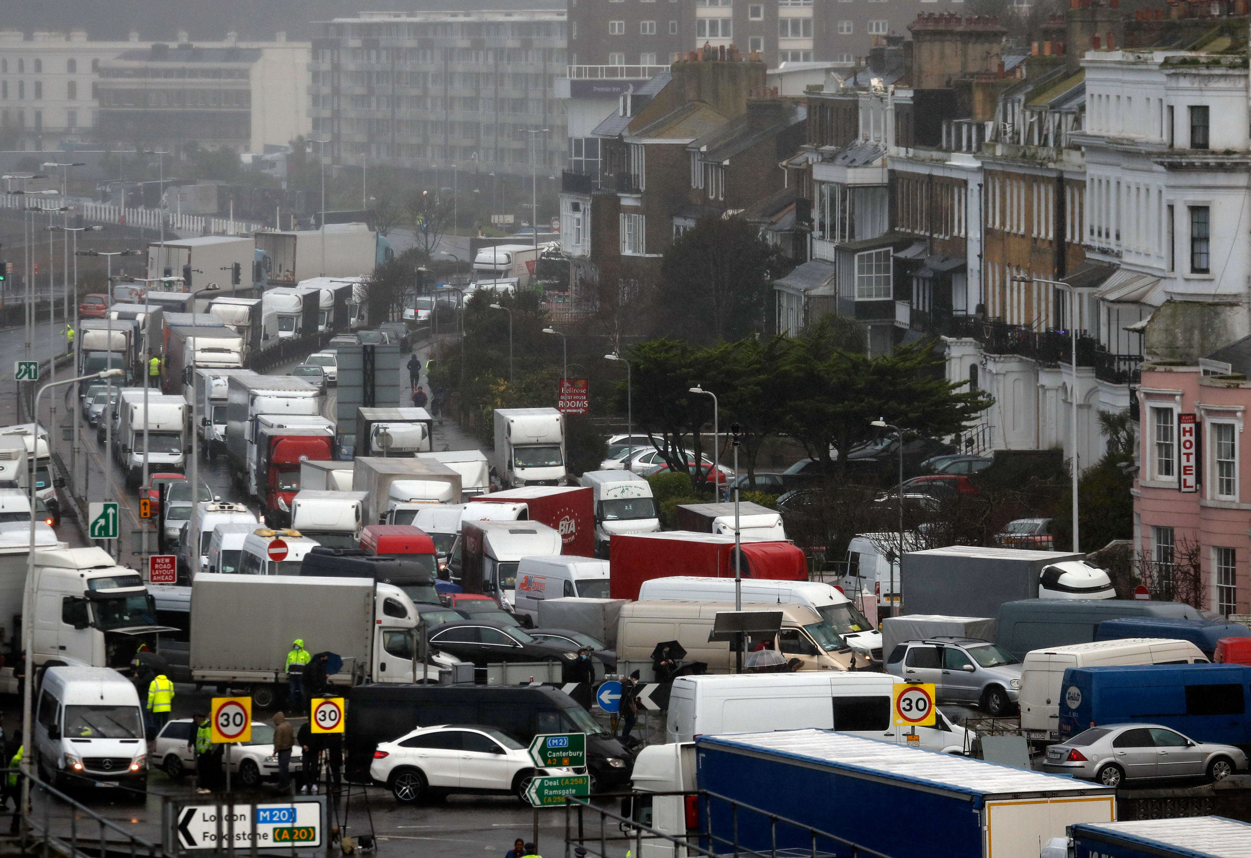 Vehicles queue at the blocked entrance to the Port of Dover in England on December 23.