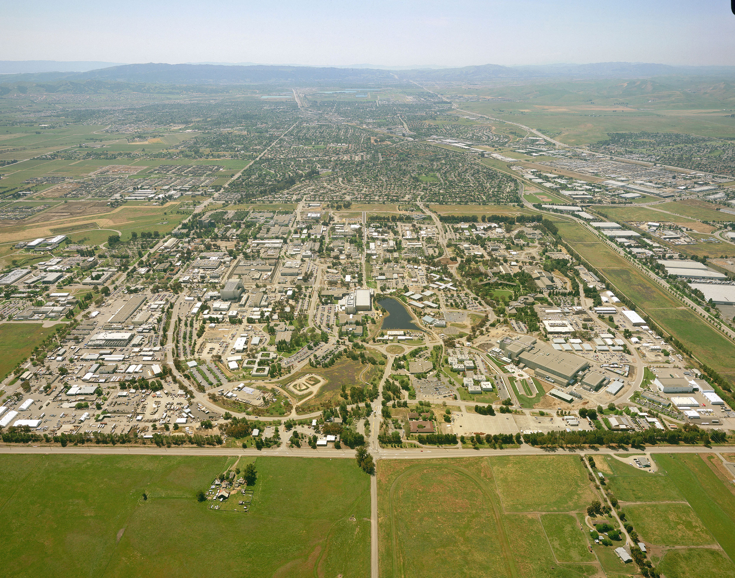 An aerial photo shows the Lawrence Livermore National Laboratory in California, where scientists have successfully produced a nuclear fusion reaction resulting in a net energy gain, a source tells CNN.