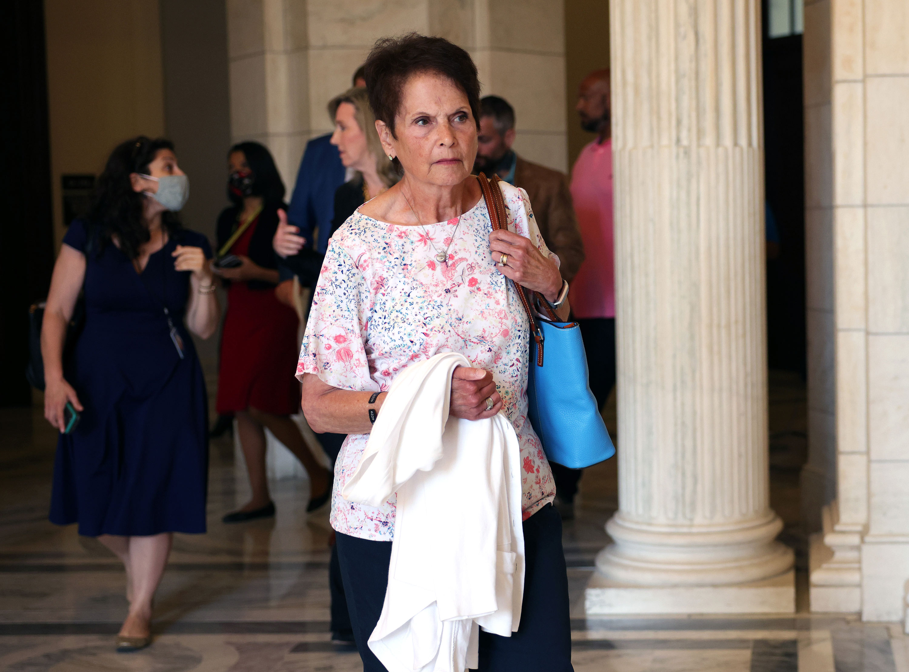 Gladys Sicknick, the mother of late Capitol Police Officer Brian Sicknick, leaves a meeting with Sen. Mitt Romney as she meets with senators to urge for a January 6 commission on May 27 in Washington, DC. 