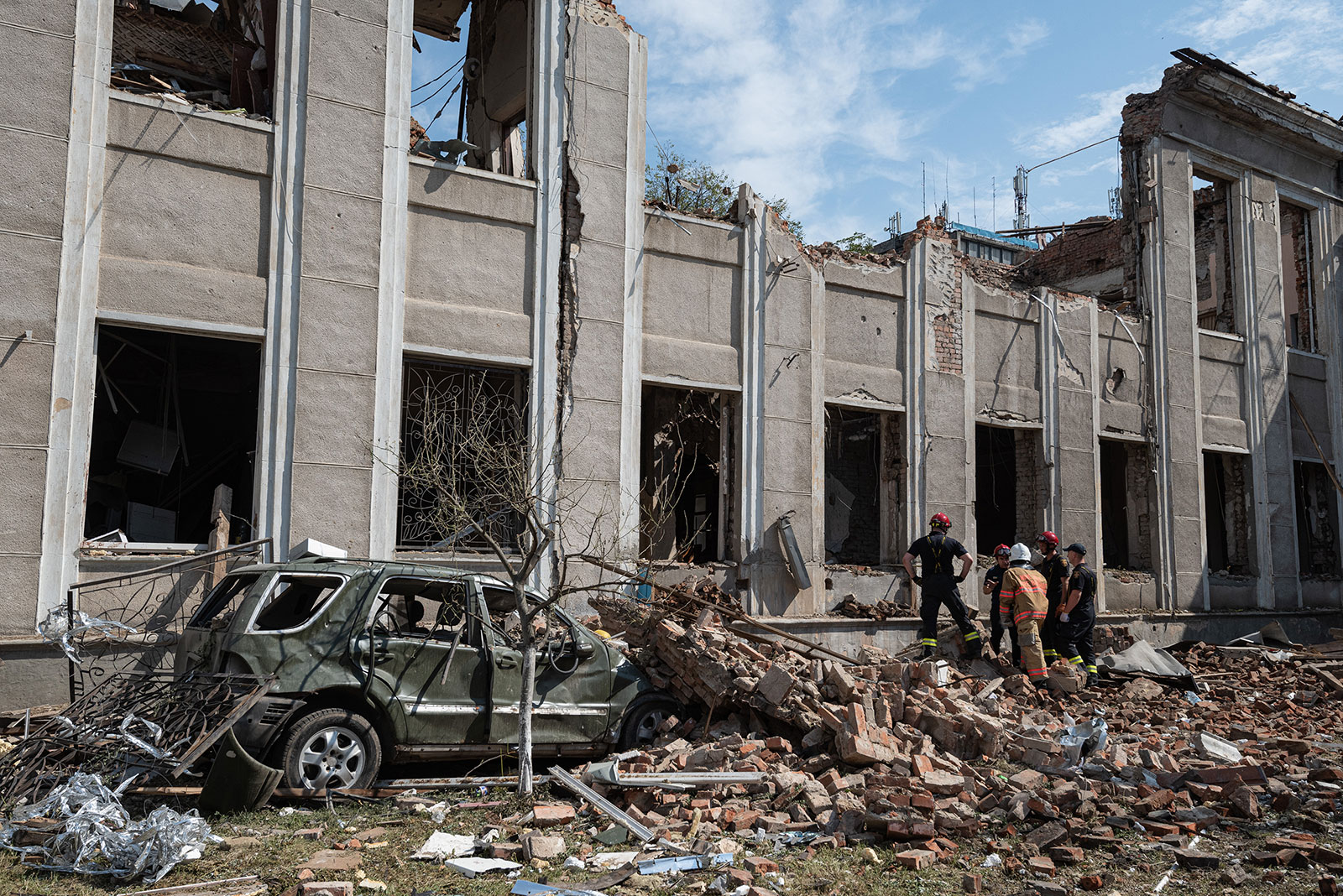 Rescuers inspect a heavily damaged building on July 15 in Vinnytsia, Ukraine. 