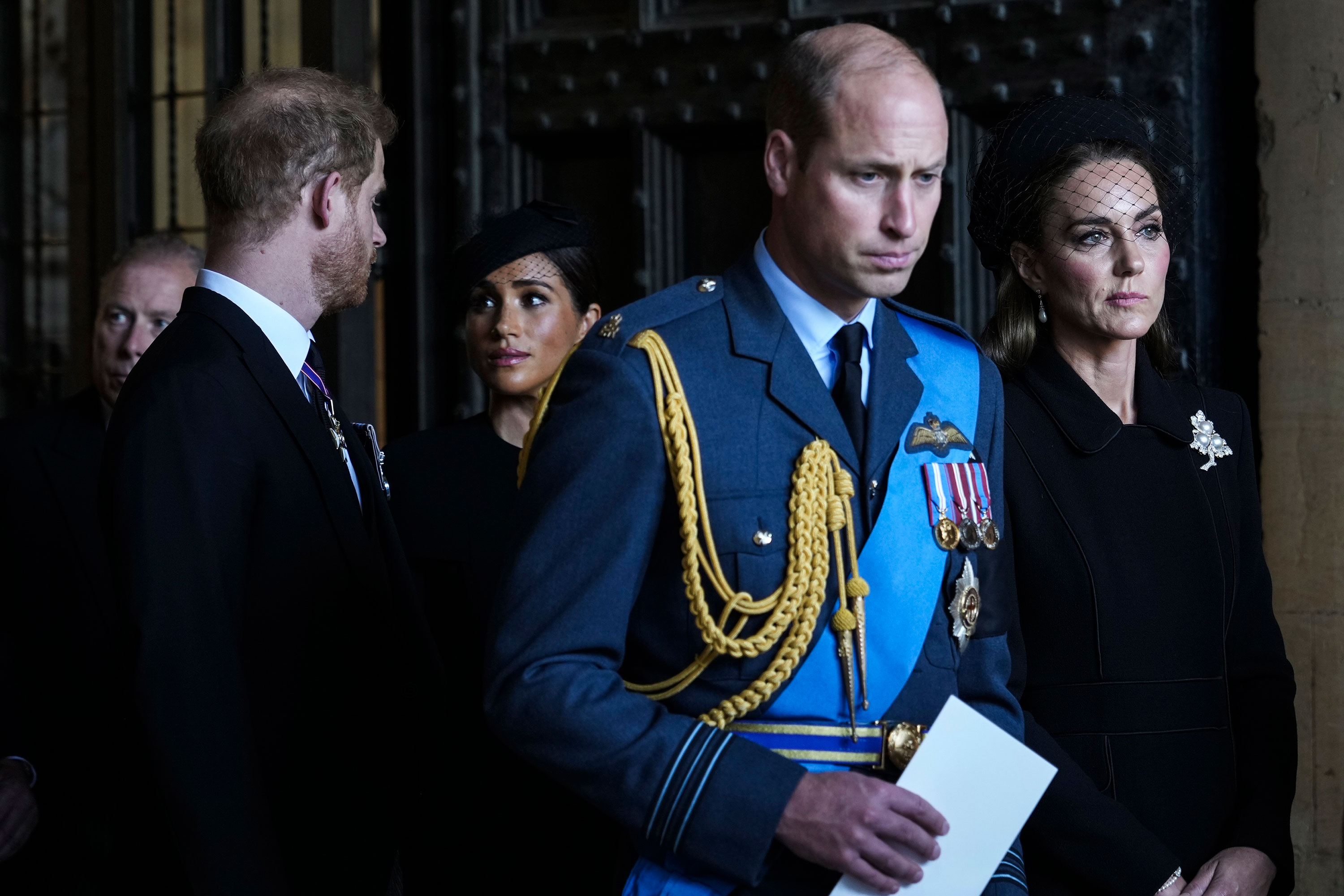 Prince Harry and Meghan, the Duchess of Sussex, walk behind William and Kate as they leave Westminster Hall in London, where the coffin of Queen Elizabeth II was lying in state in 2022. 