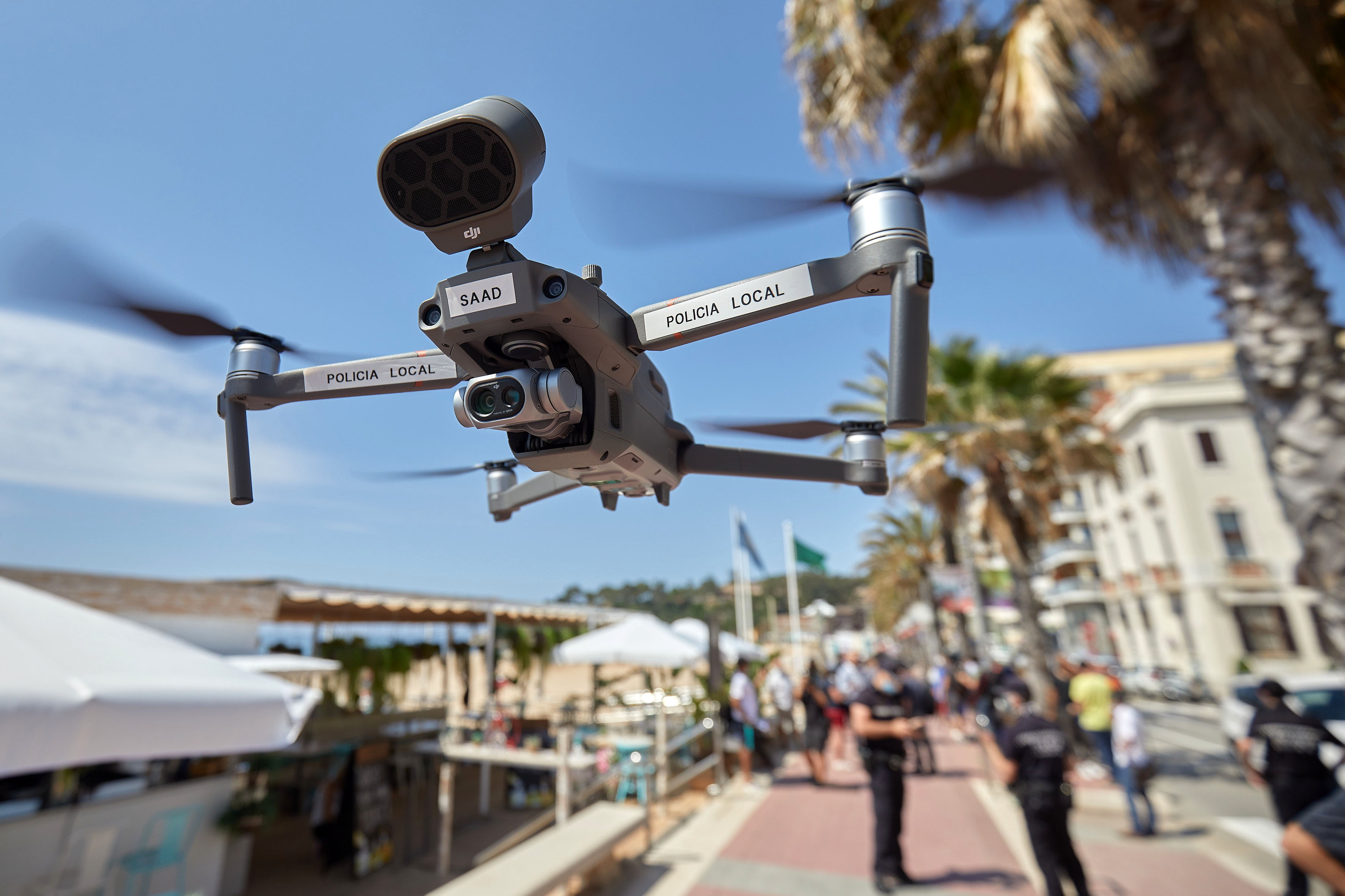 Police use a drone at a beach in Lloret de Mar, Spain, on June 22.