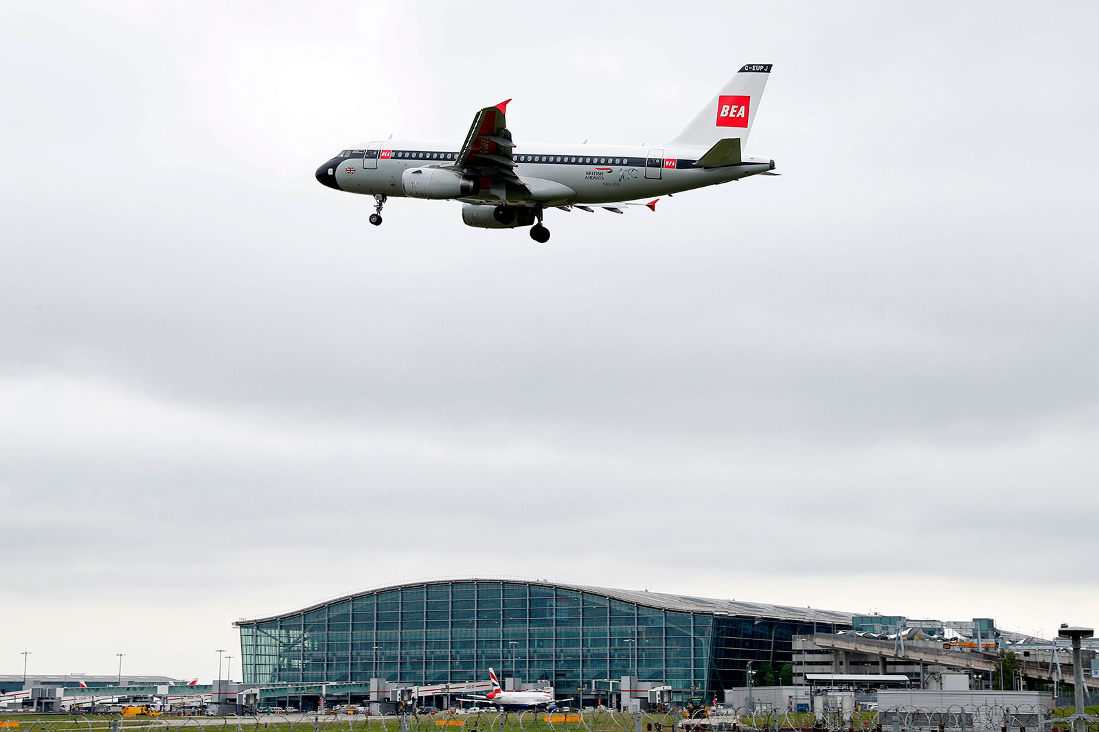 A British Airways plane lands at London Heathrow Airport on May 10.